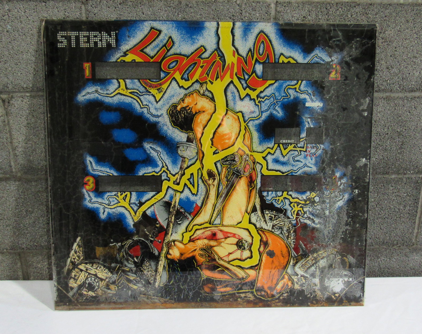 Stern Lighting Pinball Backglass: Stern Lighting Pinball Backglass. Some flaking, backglass has been taped to prevent further flaking. Local Pickup Only. Dimensions: 25.5 x 28.5