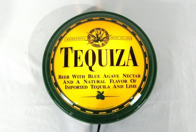 Anheuser-Busch Tequiza Beer Light Up Advertising Sign: Anheuser-Busch Tequiza Beer Light Up Advertising Sign. In-house shipping available. Dimensions: 16" Diameter.