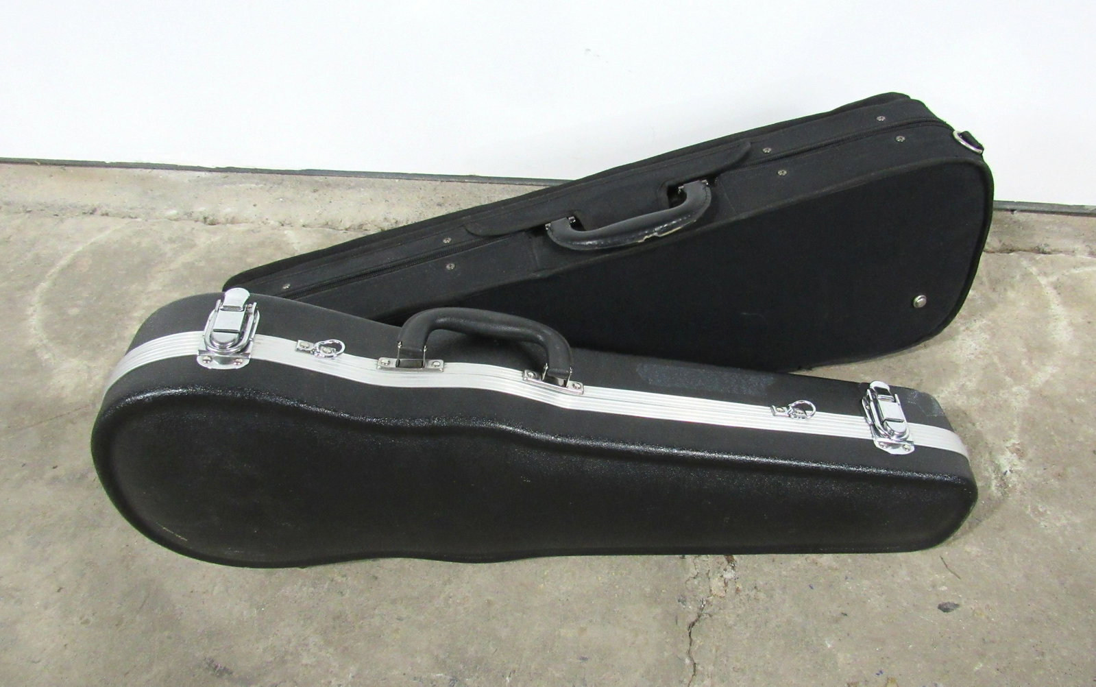 Two Violin Cases: Two Violin Cases, cases only. In- house shipping available. Dimensions for soft case: 29 x 9 x 6