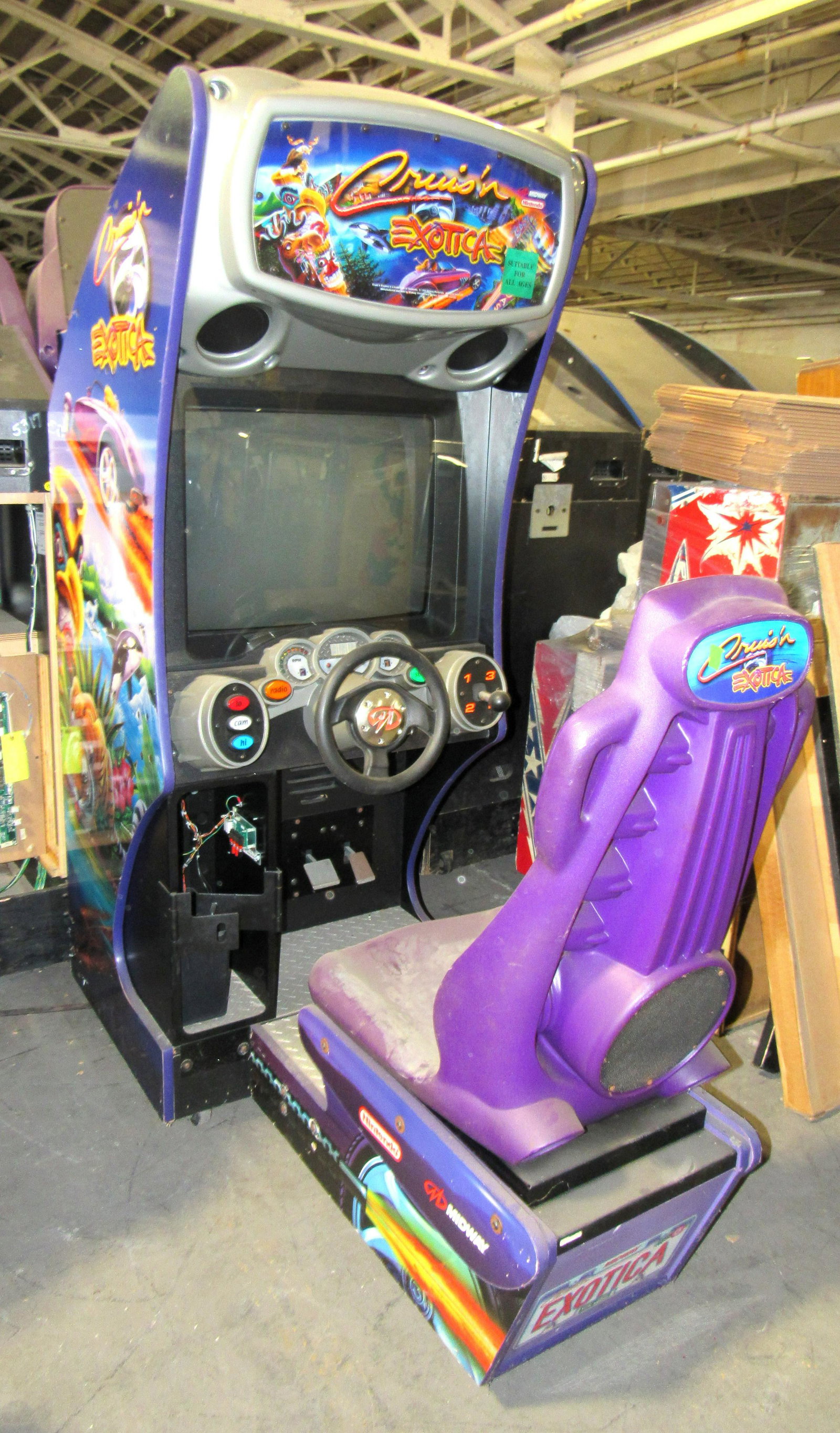 Cruis'n Exotica Sit Down Racing Arcade Game: Cruis'n Exotica Sit Down Racing Arcade Game. Incomplete, for repair or parts.This item requires third party shipping or pickup arrangements to be made. Dimensions: 77 x 30.5 x 64