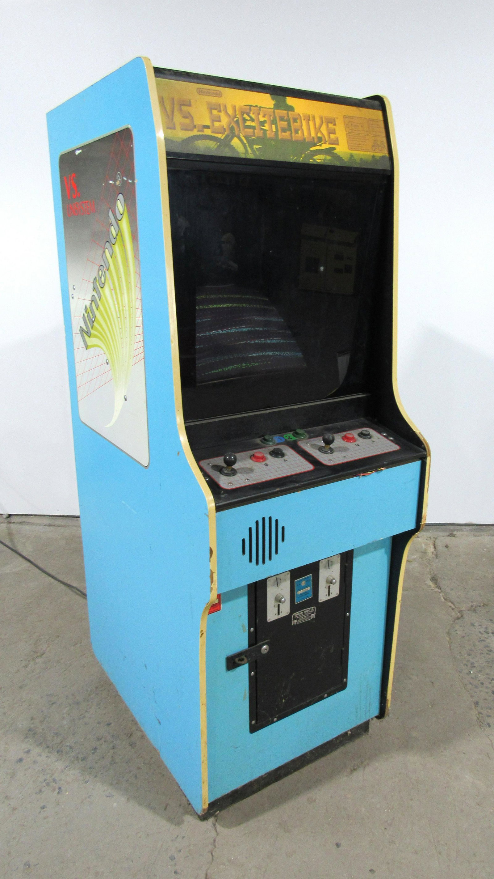 Nintendo VS. Excitebike Coin Operated Arcade Game: Nintendo VS. Excitebike Coin Operated Arcade Game. Complete, not working. This item requires third party shipping or pickup arrangements to be made. Dimensions: 67 x 24 x 34