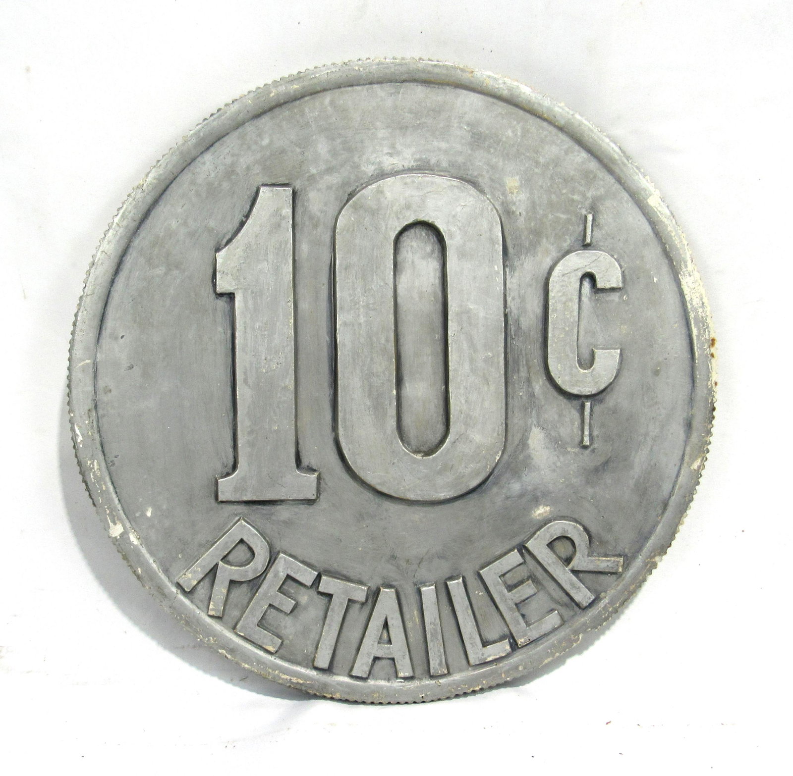 Ten Cent Retailer Plaster Advertising Sign: Ten Cent Retailer Plaster Advertising Sign. This item requires third party shipping or pickup arrangements to be made. Dimensions: 20 x 20 x 1.5