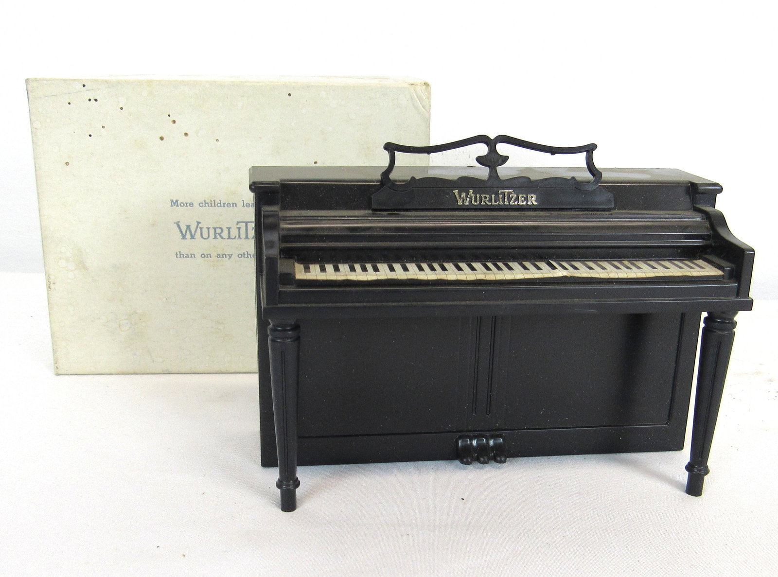 Wurlitzer Small Toy Piano Bank: Wurlitzer Small Toy Piano Bank. In-house shipping available. Dimensions of box: 4.5 x 6 x 3