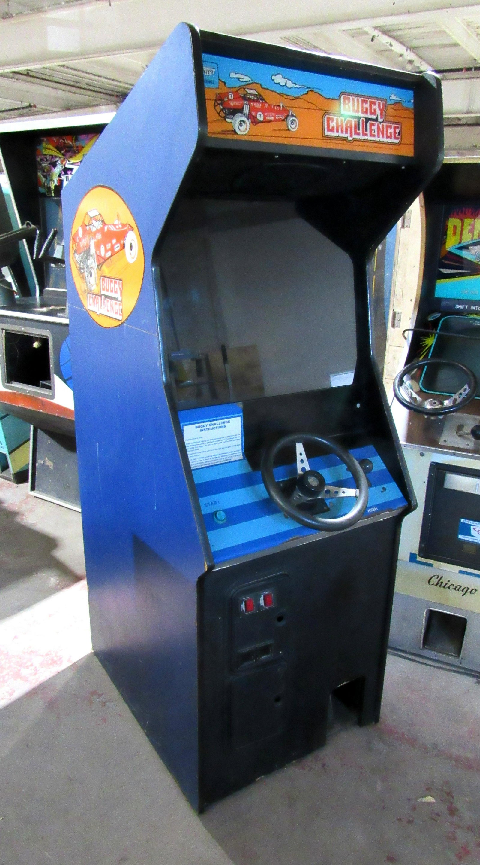 Taito Buggy Challenge Coin Operated Arcade Game: Taito Buggy Challenge Coin Operated Arcade Game. Not working, appears complete. Dimensions: 72 x 26 x 38