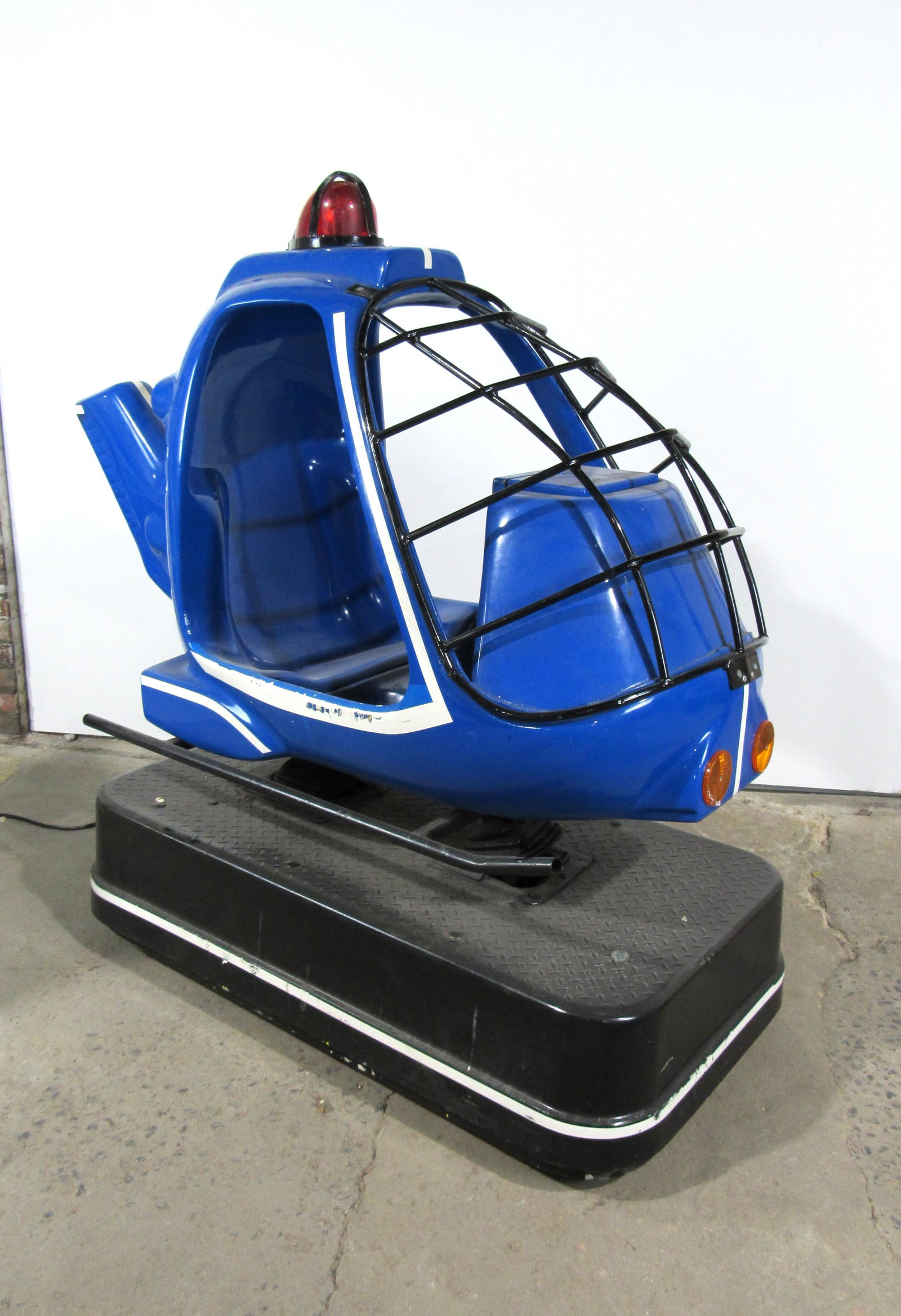 Blue Helicopter Coin Operated Kiddie Ride: Blue Helicopter Coin Operated Kiddie Ride, working with sound. This item requires third party shipping or pickup arrangements to be made. Dimensions: 61 x 28 x 70