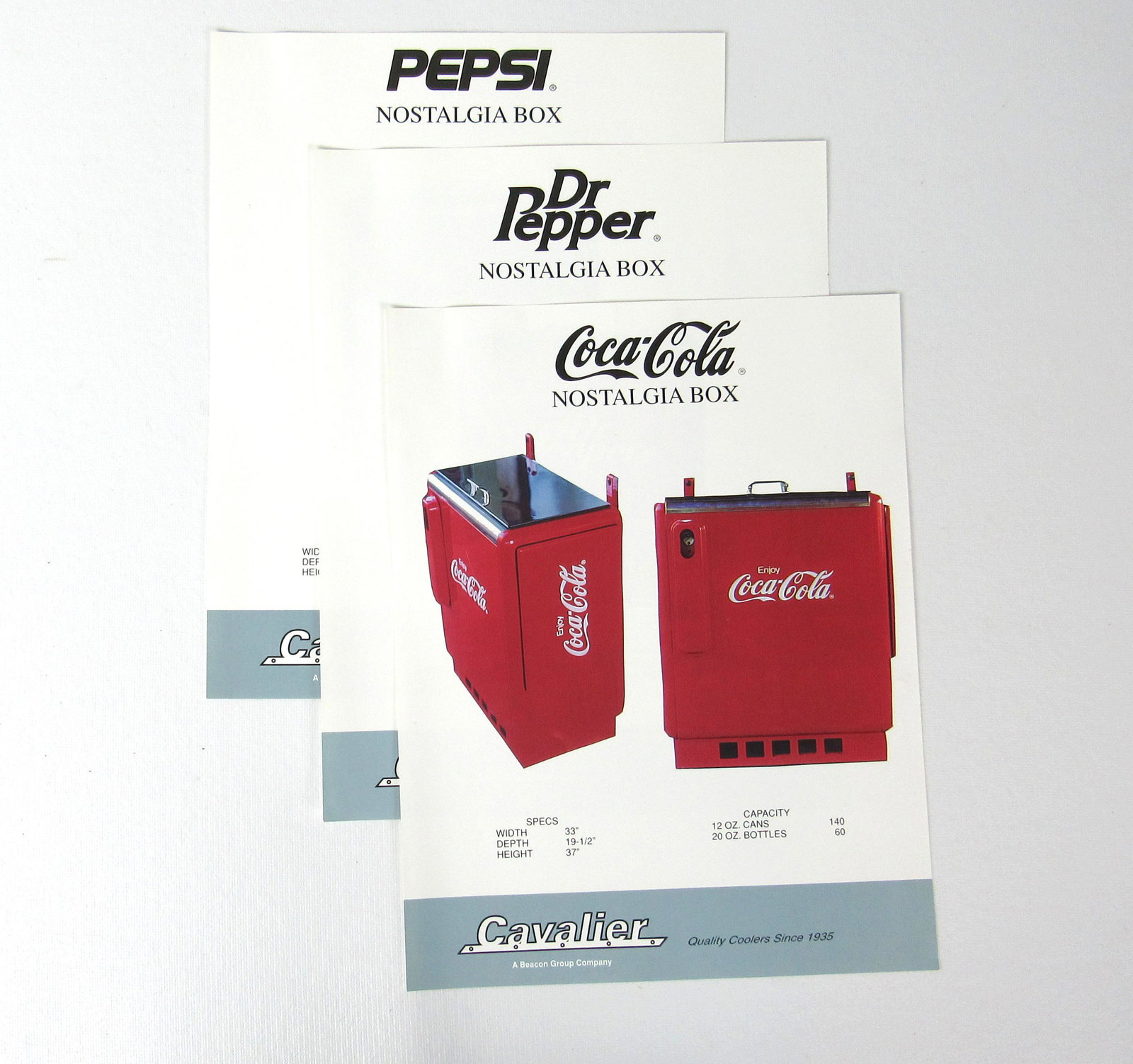 Three Cavalier "Nostalgia Box" Cooler Advertising: Three Cavalier "Nostalgia Box" Cooler Advertising Flyers. Flyers feature Coca Cola, Dr. Pepper and Pepsi versions. One of the last coolers that was built by Cavalier. In-house shipping available.