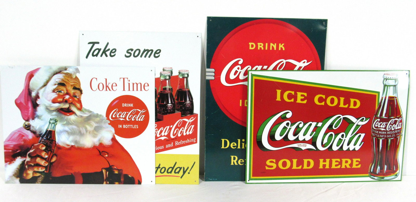 Four Coca-Cola Metal Advertising Signs: Four Coca-Cola Metal Signs, reproduction / newer. In-house shipping available. Dimensions for santa: 12.5 x 16