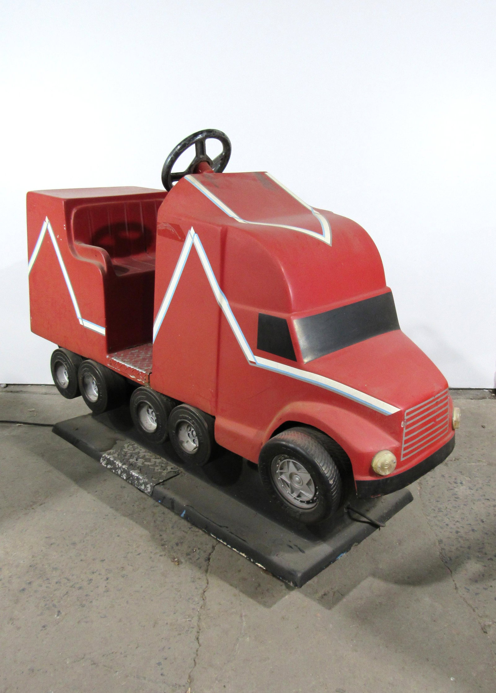 Red Semi-Truck Coin Operated Kiddie Ride: Red Semi-Truck Coin Operated Kiddie Ride, working with sound. This item requires third party shipping or pickup arrangements to be made. Dimensions: 49 x 26 x 70
