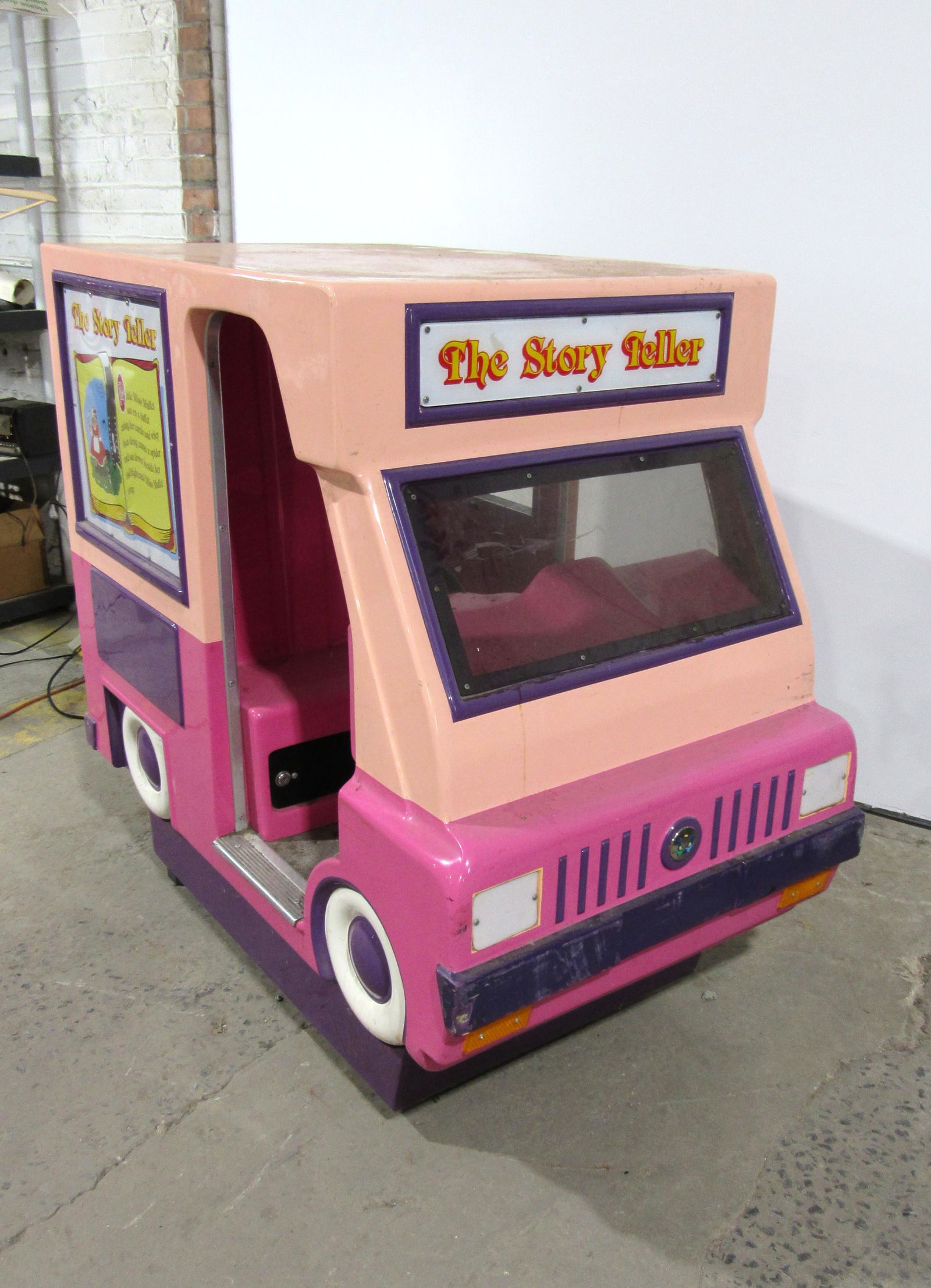 Story Teller Bus Coin Operated Kiddie Ride: Story Teller Bus Coin Operated Kiddie Ride. Working with sound, no screen inside. This item requires third party shipping or pickup arrangements to be made. Dimensions: 48 x 31 x 55