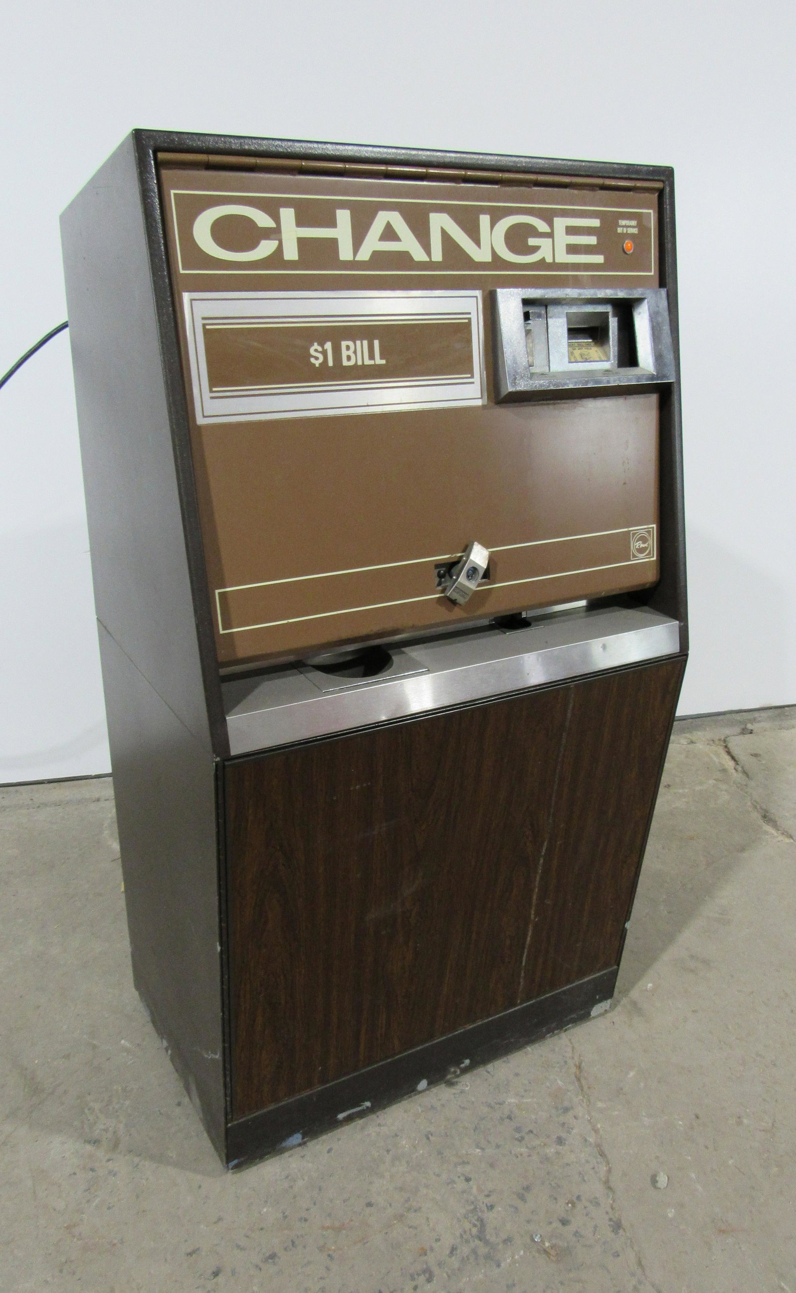Rowe Coin Operated Change Machine: Rowe Coin Operated Change Machine. Powers on, not otherwise tested. This item requires third party shipping or pickup arrangements to be made. Dimensions: 52.5 x 28 x 19