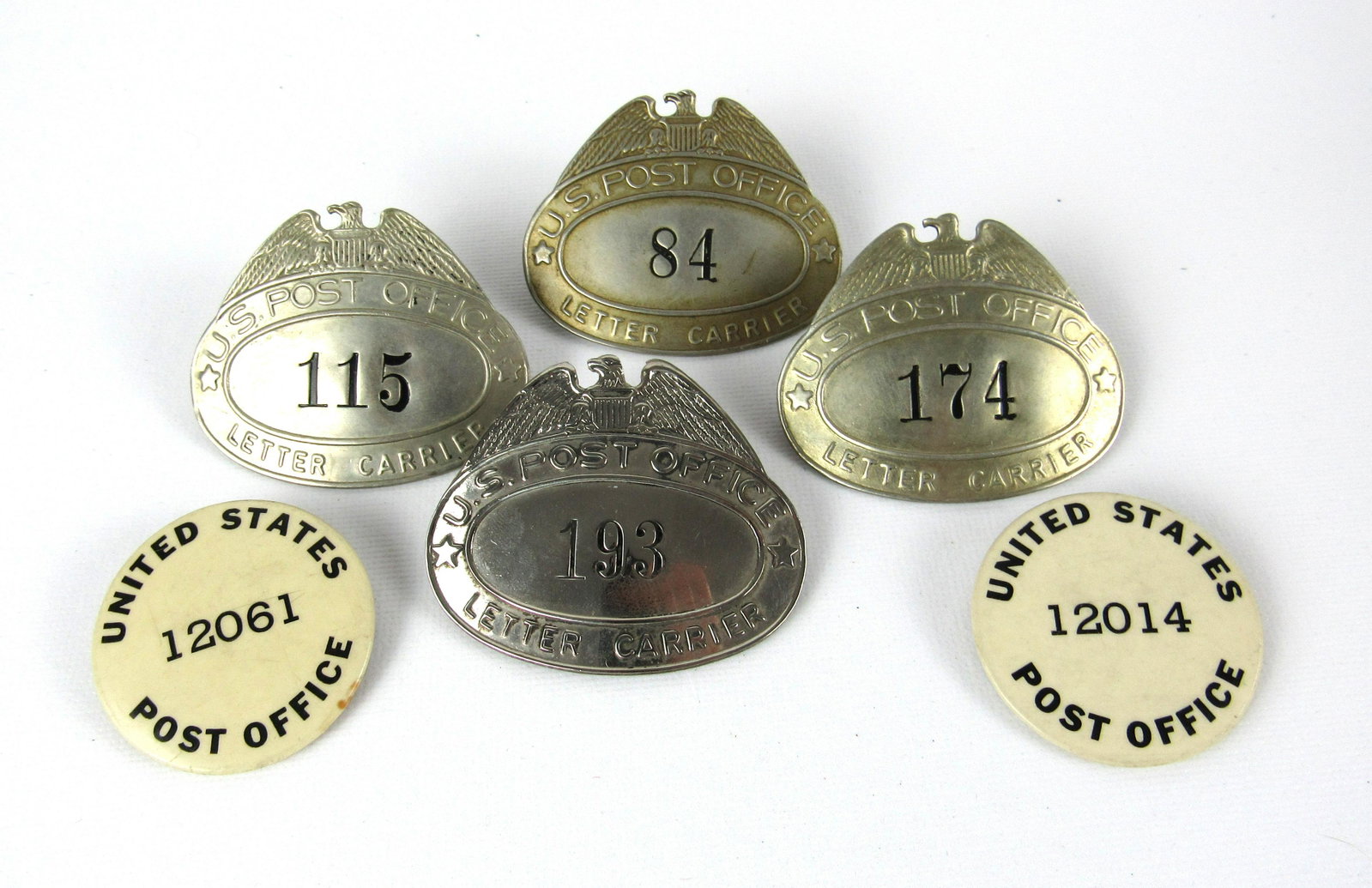 U.S. Post Office Letter Carrier Bagdes: Four U.S. Post Office Letter Carrier Bagdes and two seasonal workers buttons. In-house shipping available.