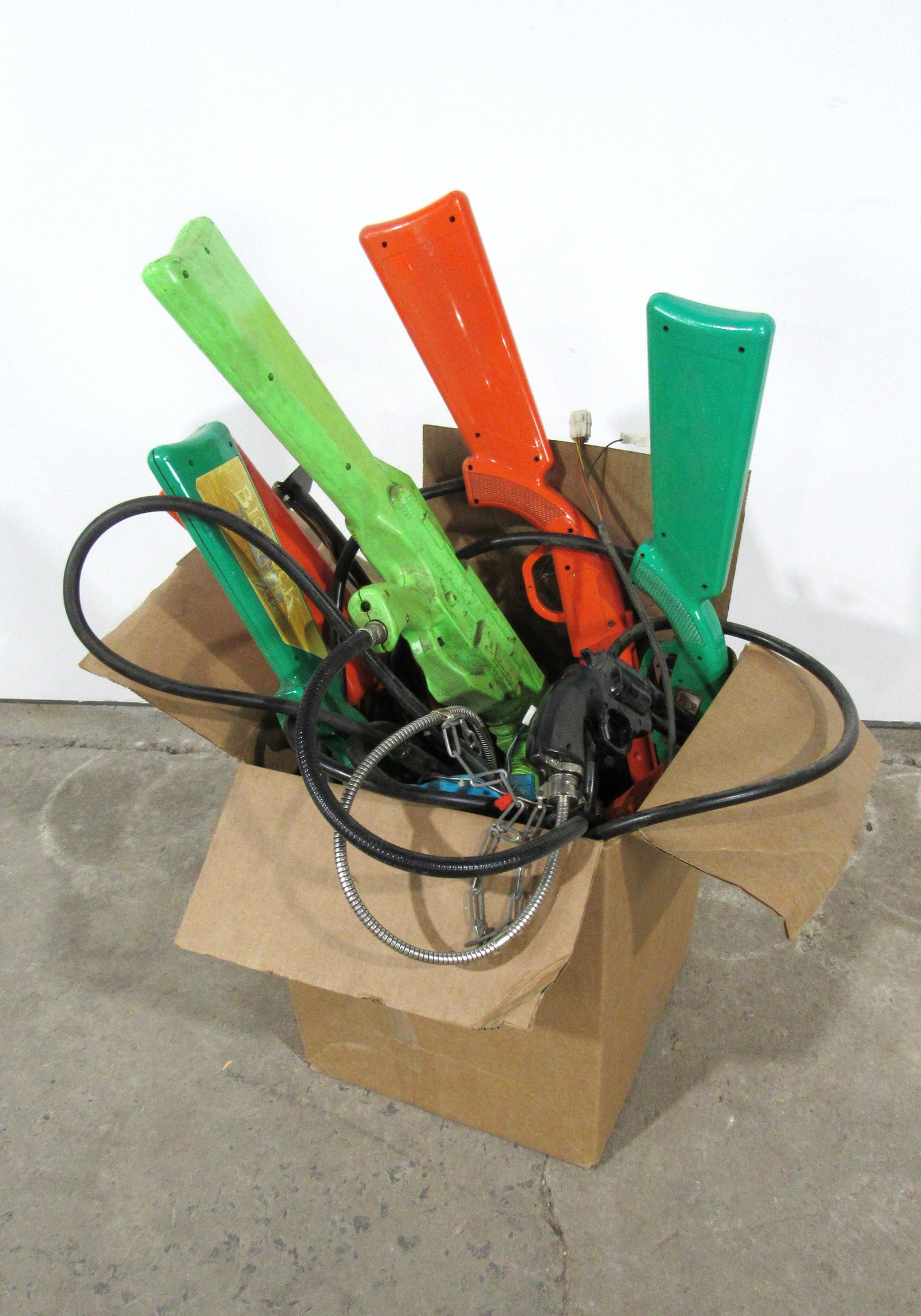 Assorted Box of Arcade Game Guns: Assorted Box of Arcade Game Guns. Big Buck Hunter, etc. Untested, sold as-is. This item requires third party shipping or pickup arrangements to be made.
