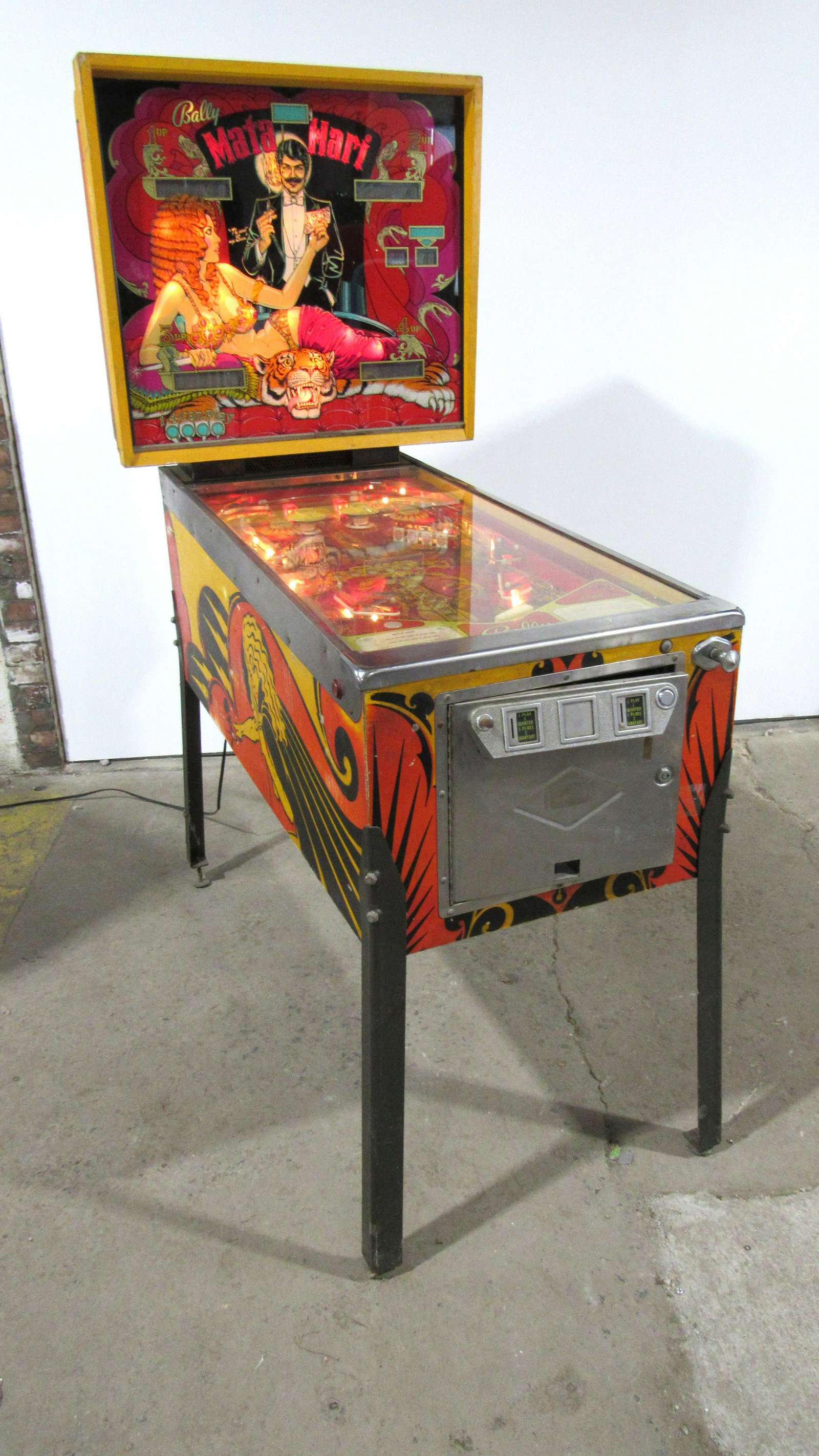 Bally Mata Hari Pinball Coin Operated Arcade Game: Bally Mata Hari Pinball Coin Operated Arcade Game, not working. Locked, no key. This item requires third party shipping or pickup arrangements to be made. Dimensions: 72 x 31 x 55
