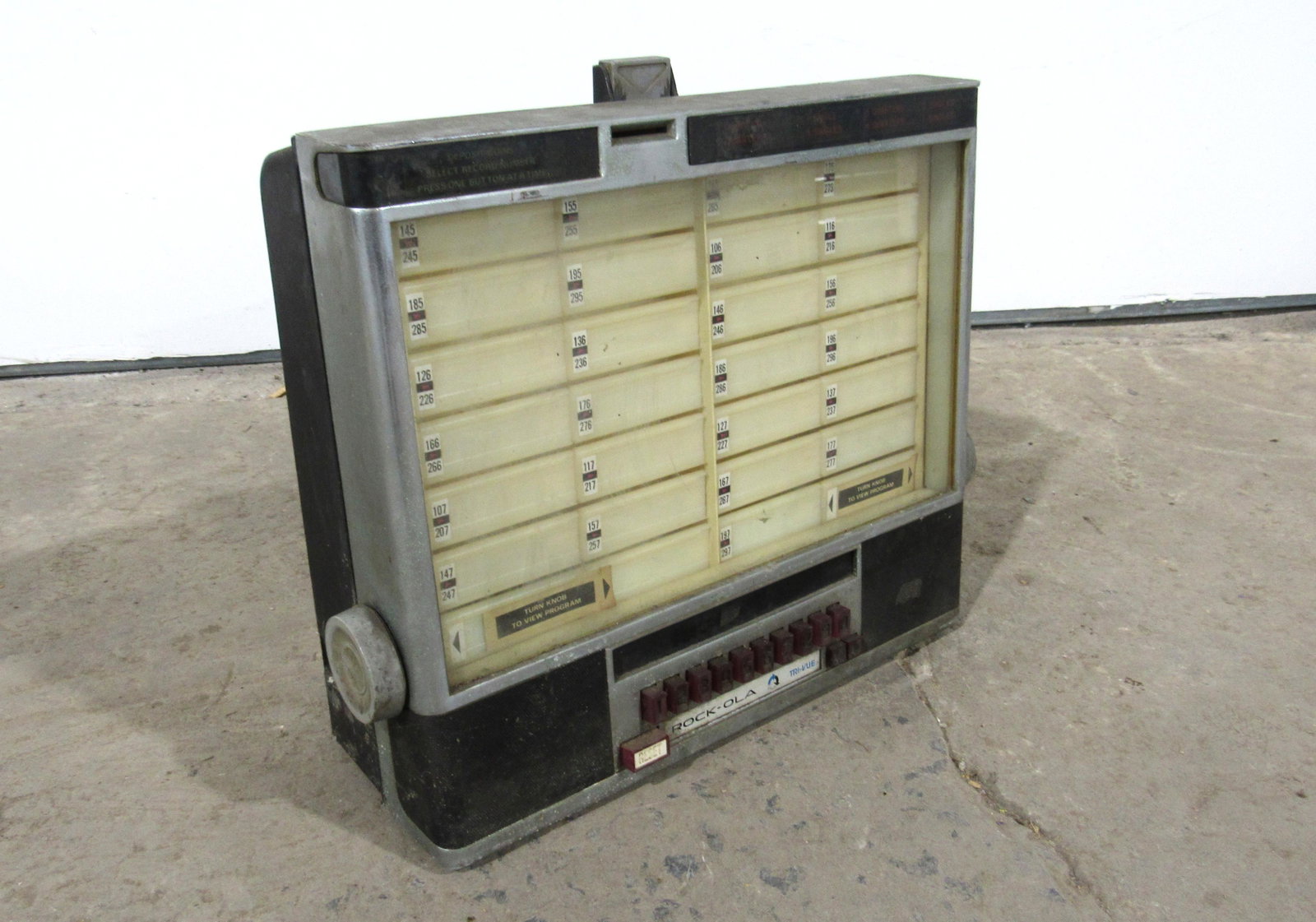 Rockola Tri-Vue Model 506 Wallbox: Rockola Tri-Vue Model 506 Coin Operated Wallbox, no key. This item requires third party shipping or pickup arrangements to be made. Dimensions: 16 x 17 x 5