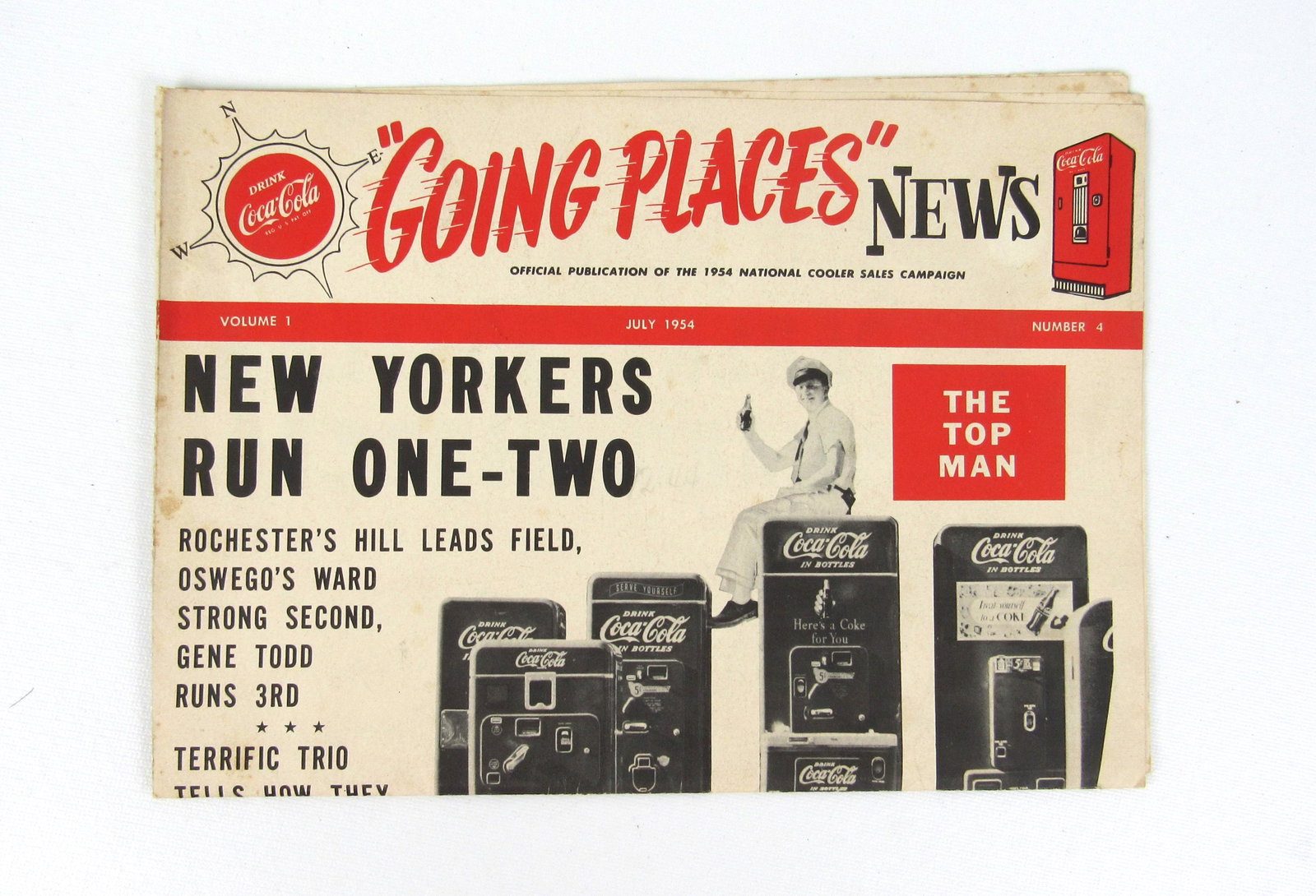 1954 "Going Places" Coca-Cola Cooler Salesman Newspaper: 1954 "Going Places" Coca-Cola Cooler Salesman Newspaper. In-house shipping available. Dimensions: 15 x 5 x 11