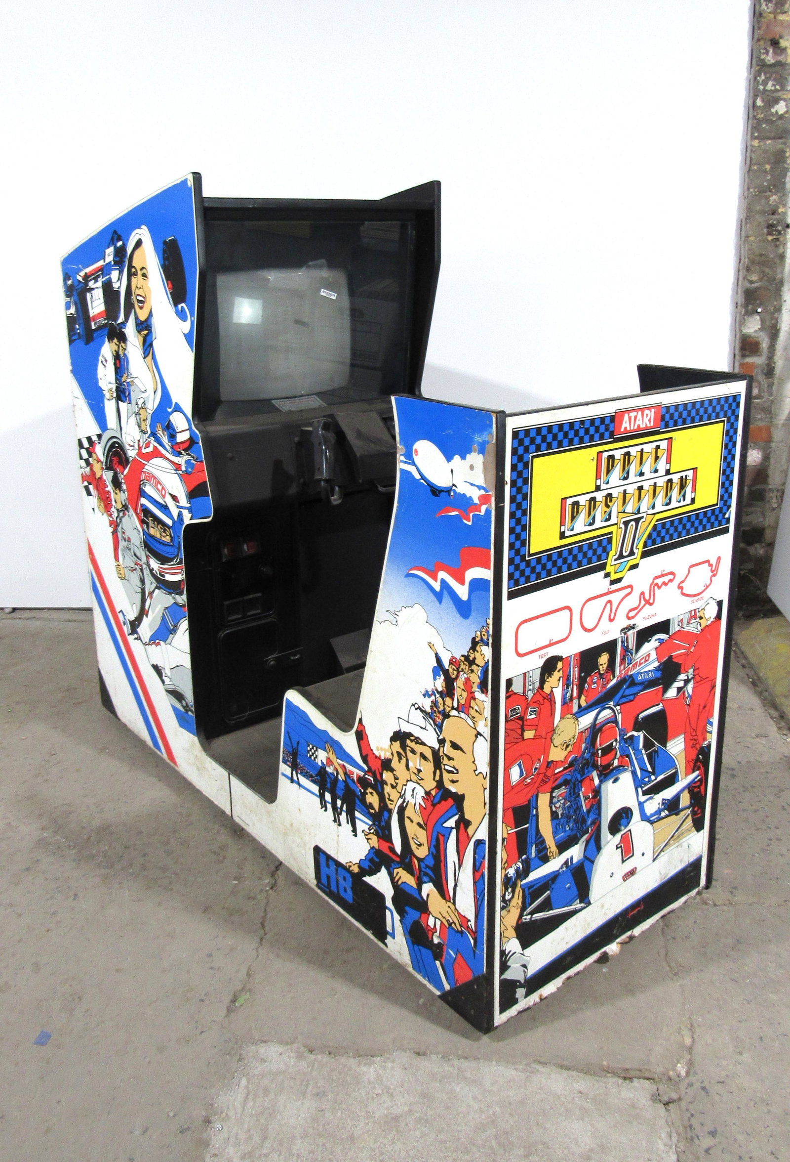 Atari Pole Position II Sit-Down Racing Arcade Game: Atari Pole Position II Sit-Down Racing Arcade Game. Not working, no boards. This item requires third party shipping or pickup arrangements to be made. Dimensions: 59 x 26 x 65