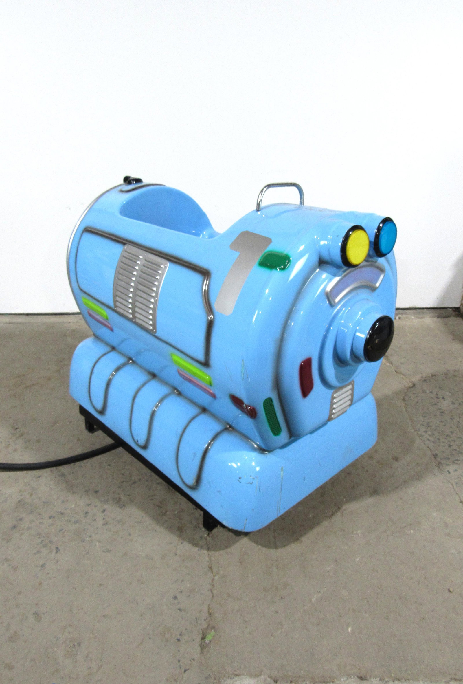 Nunu Kiddie Ride Arcade Game: Nunu Kiddie Ride Arcade Game. Not working, no coin mechanism. This item requires third party shipping or pickup arrangements to be made. Dimensions: 38 x 26 x 49