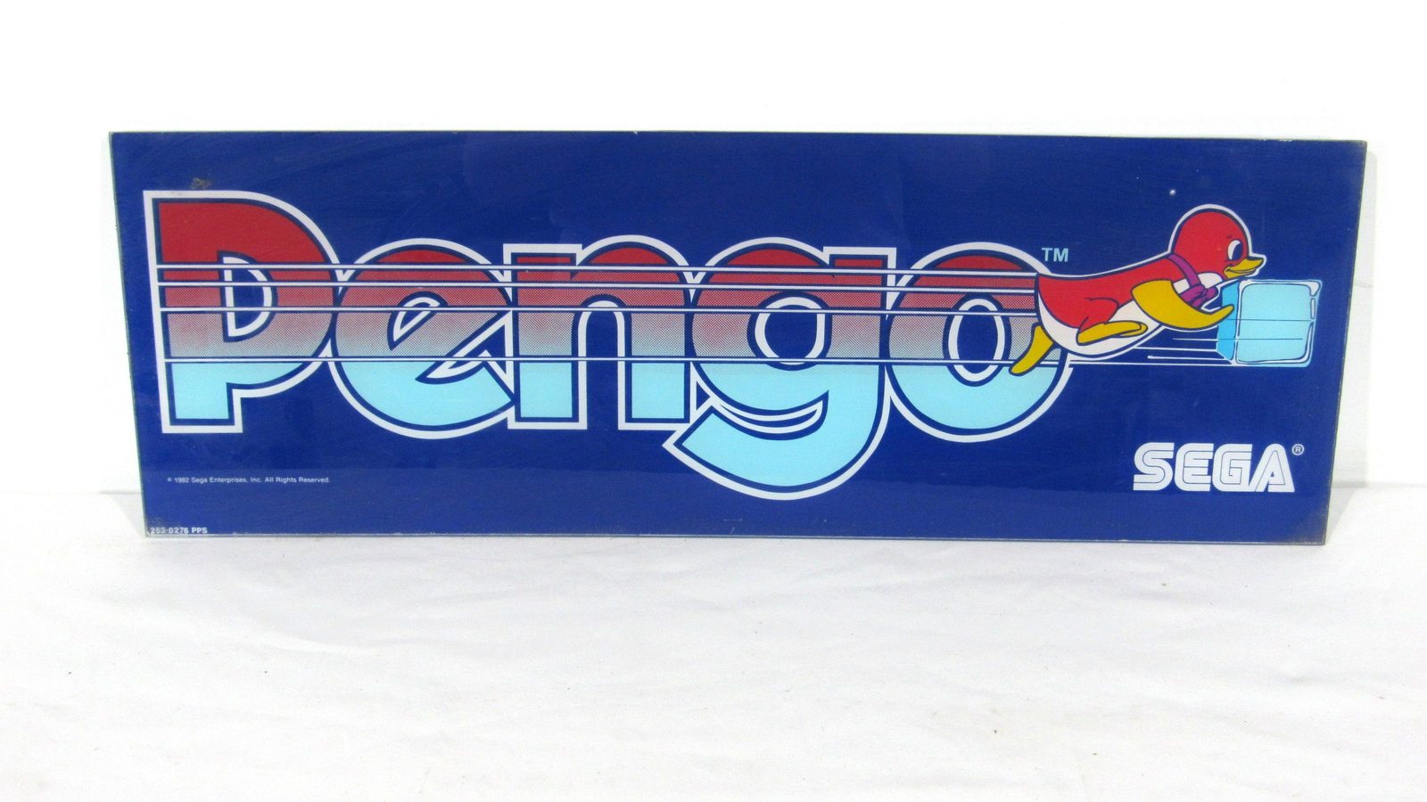 Sega Pengo Arcade Game Header: Sega Pengo Arcade Game Header. In-house shipping available. Dimensions: 8.5 x 24