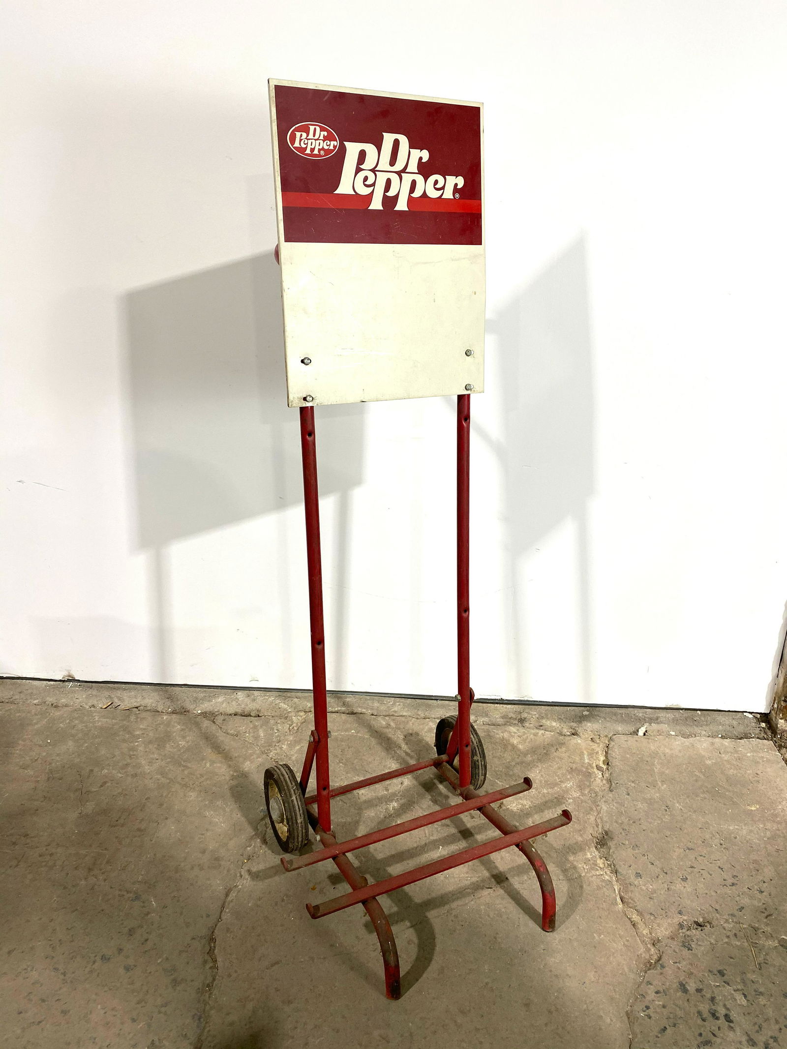 Dr. Pepper Soda Bottle Hand Cart: Dr. Pepper Soda Bottle Hand Cart. This item requires third party shipping or pickup arrangements to be made. Dimensions: 60 x 22 x 20