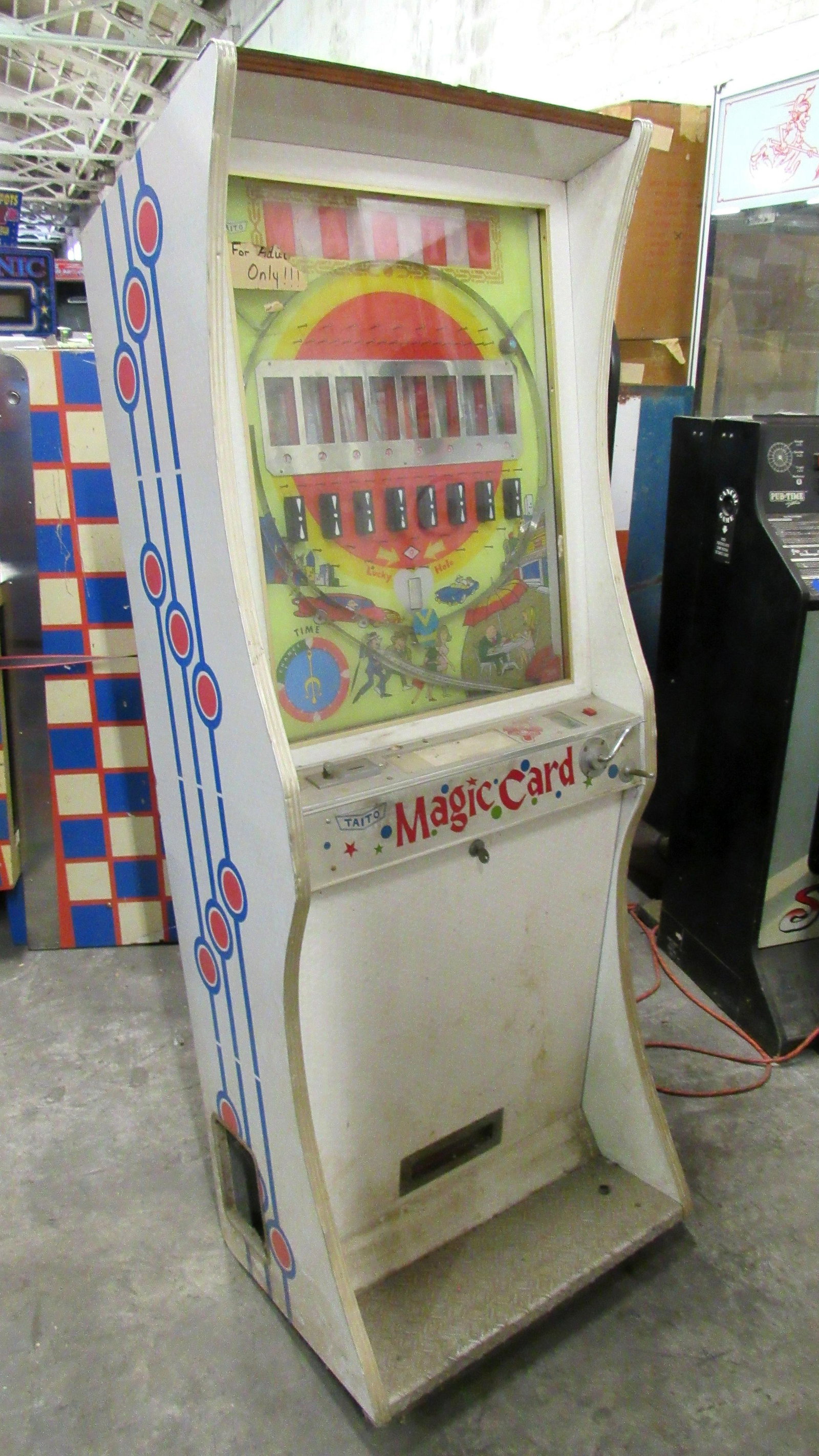 Taito Magic Card Adult Coin Operated Arcade Game: Taito Magic Card Adult Coin Operated Arcade Game, not working. Base needs fixed, sold as-is. This item requires third party shipping or pickup arrangements to be made. Dimensions: 64 x 24 x 18