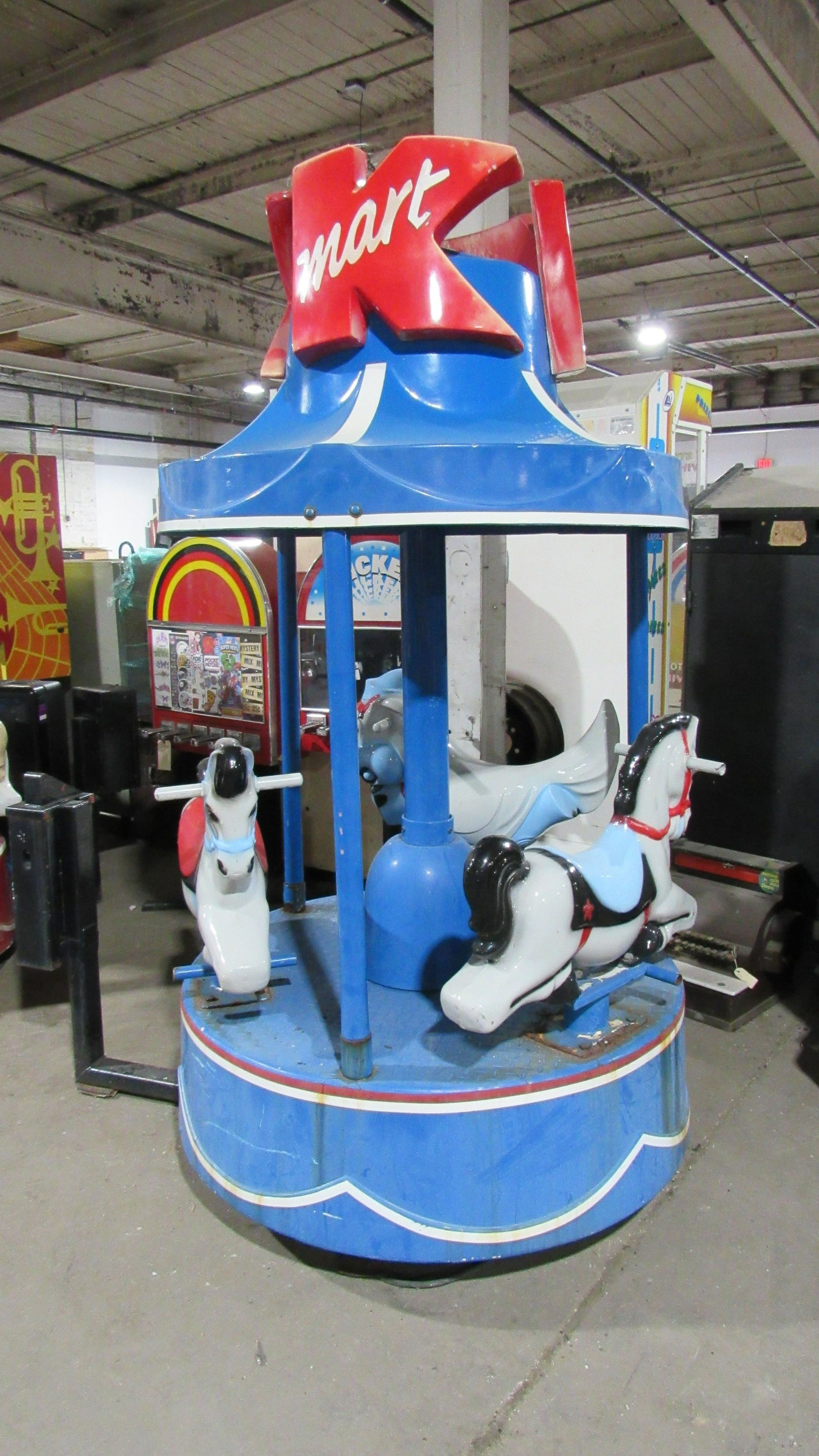 Horse Carousel Coin Operate Kiddie Ride: Horse Carousel Coin Operate Kiddie Ride, working with sound. This item requires third party shipping or pickup arrangements to be made. Dimensions: 87 x 75 x 50