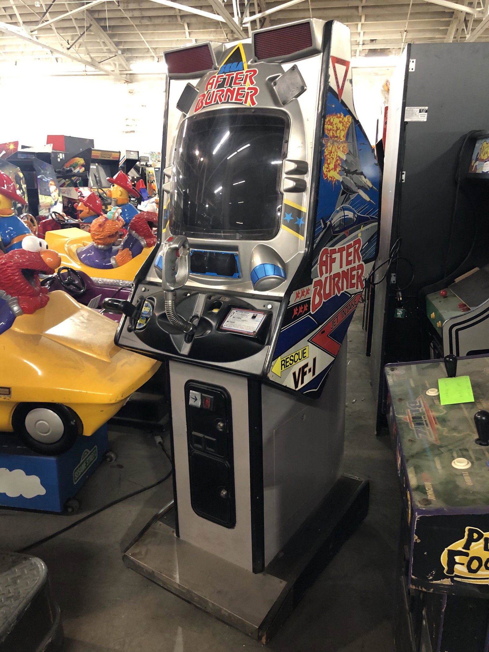 Sega After Burner Arcade Game: Sega After Burner Arcade Game. No back door, otherwise complete. This item requires third party shipping or pickup arrangements to be made.