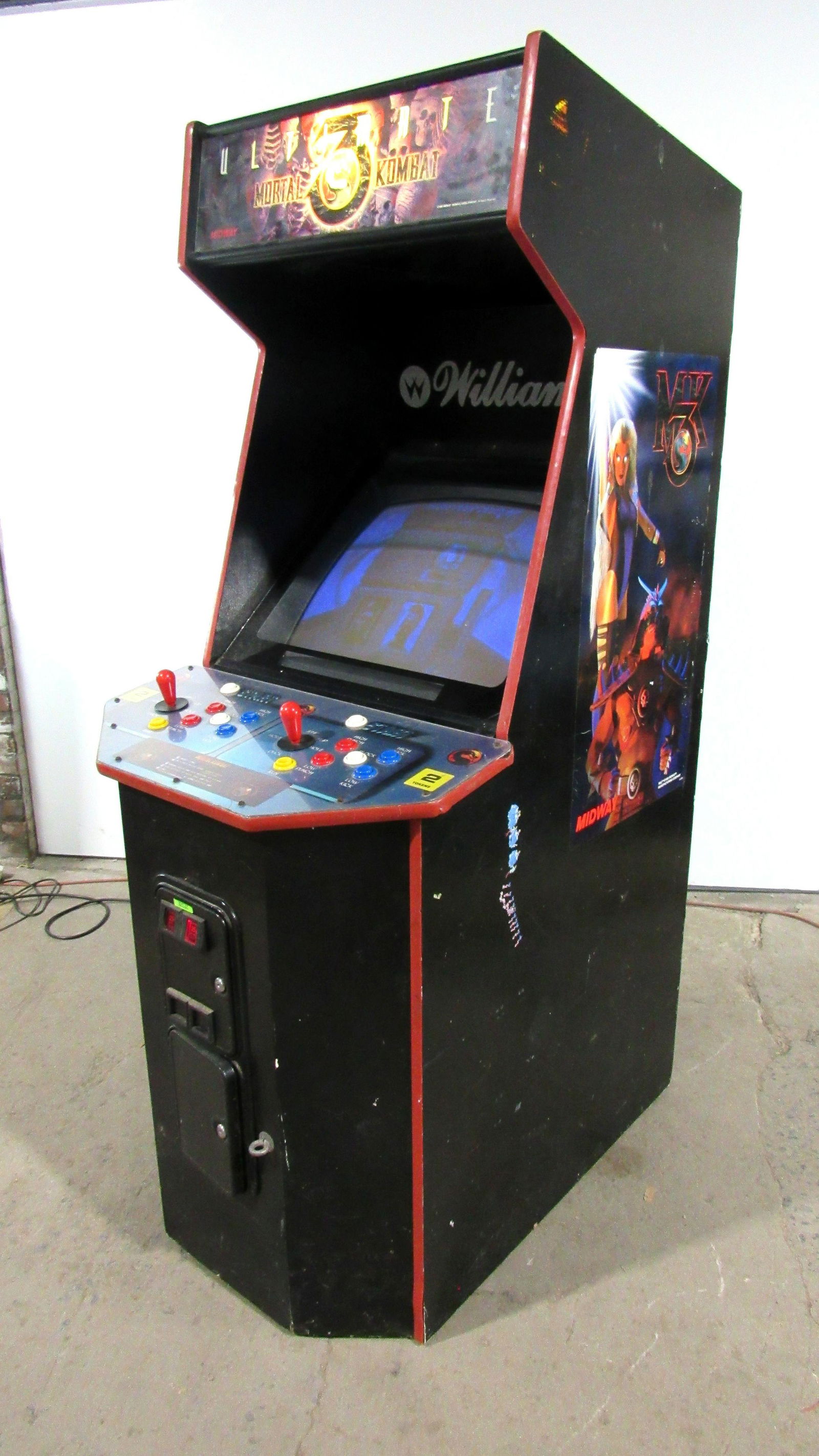 Midway Mortal Kombat 3 Arcade Game: Midway Mortal Kombat 3 Arcade Game, working. Blue monitor, no back door. This item requires third party shipping or pickup arrangements to be made. Dimensions: 79 x 29 x 40