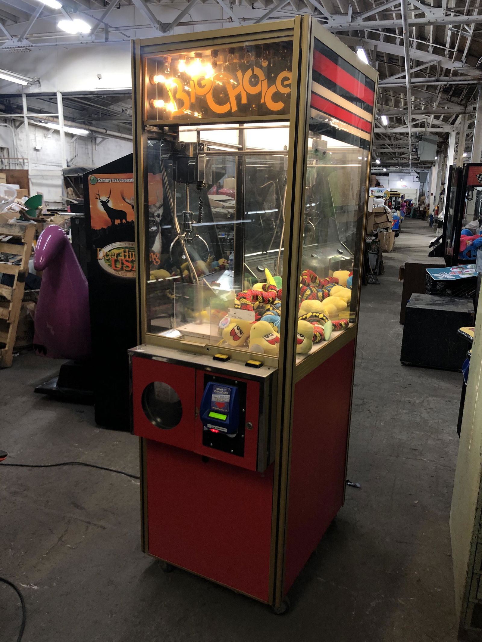 Big Choice Crane Coin Operated Arcade Game: Big Choice Crane Coin Operated Arcade Game, not working. This item requires third party shipping or pickup arrangements to be made. Dimensions: 77 x 24 x 32