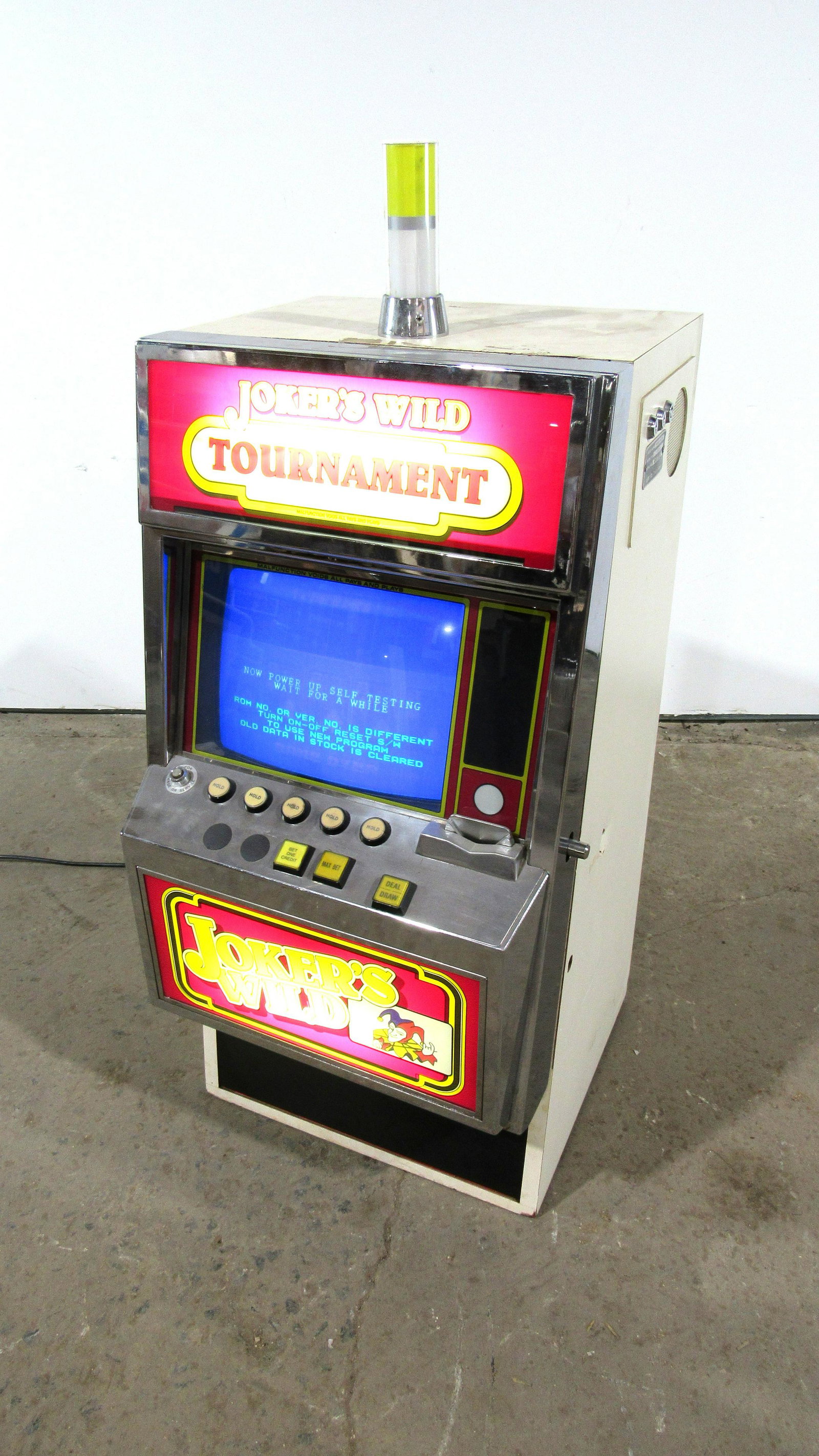 Joker's Wild Coin Operated Slot Machine: Joker's Wild Coin Operated Slot Machine, powers on. This item requires third party shipping or pickup arrangements to be made. Dimensions: 45 x 19 x 21