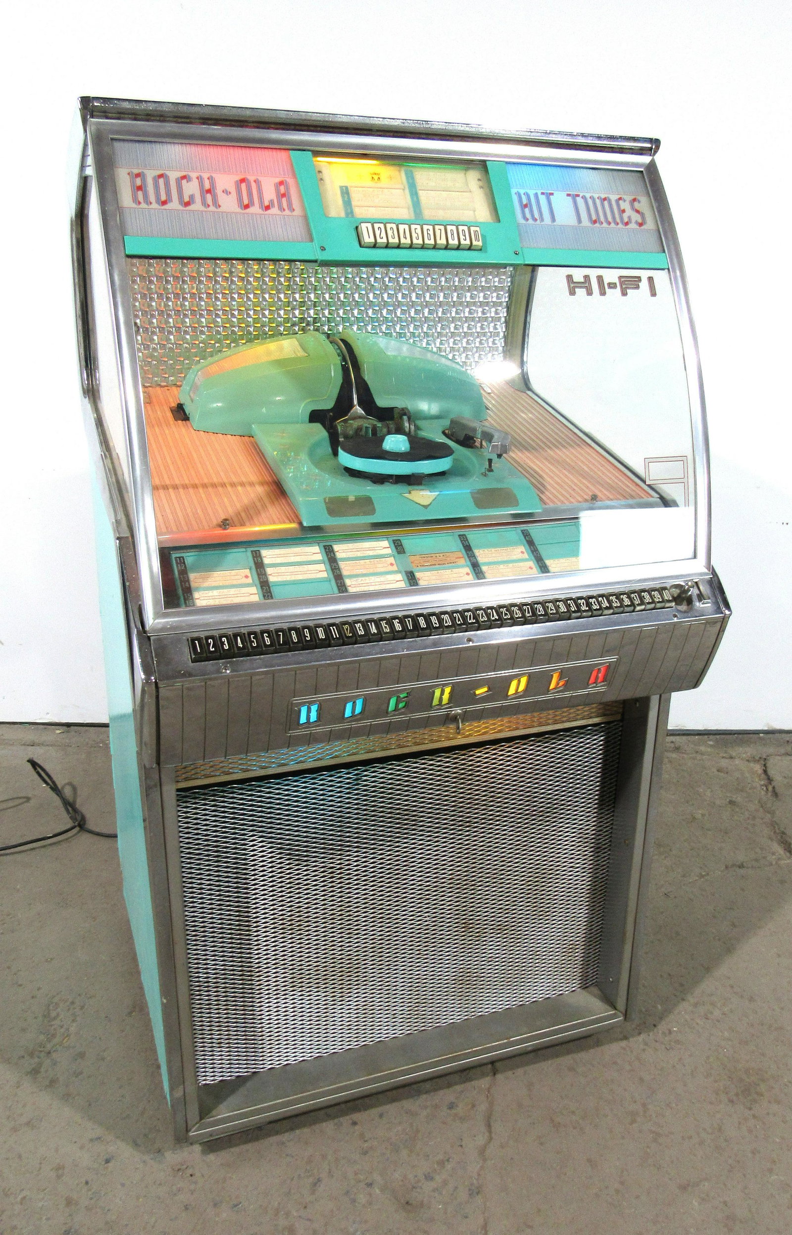Rockola Model 1462 Coin Operated Jukebox: Rockola Model 1462 Coin Operated Jukebox. Missing back door. Record carousel spun when plugged in but it did not select. Assume it may need some work. This item requires third party shipping or pickup