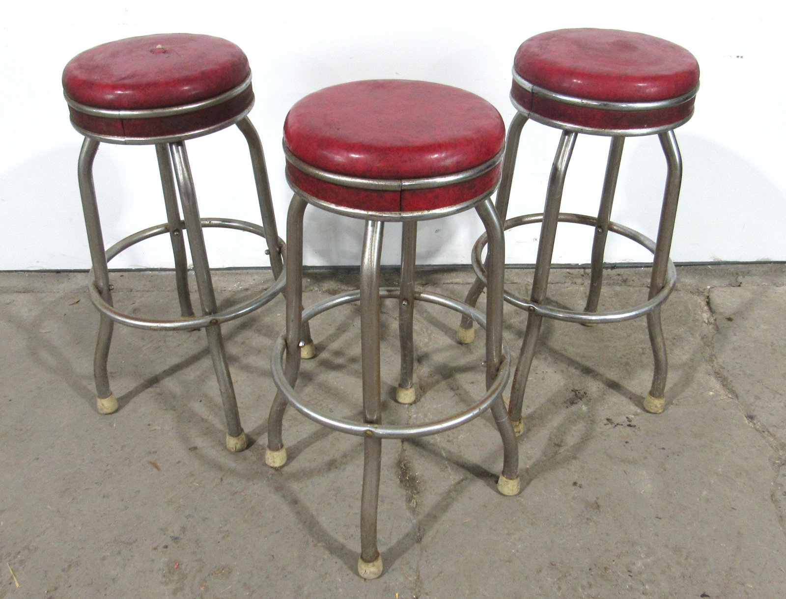 Three Cosco Vintage Diner Bar Stools: Three Cosco Vintage Diner Bar Stools. This item requires third party shipping or pickup arrangements to be made. Dimensions: 31 x 17.5 x 17.5