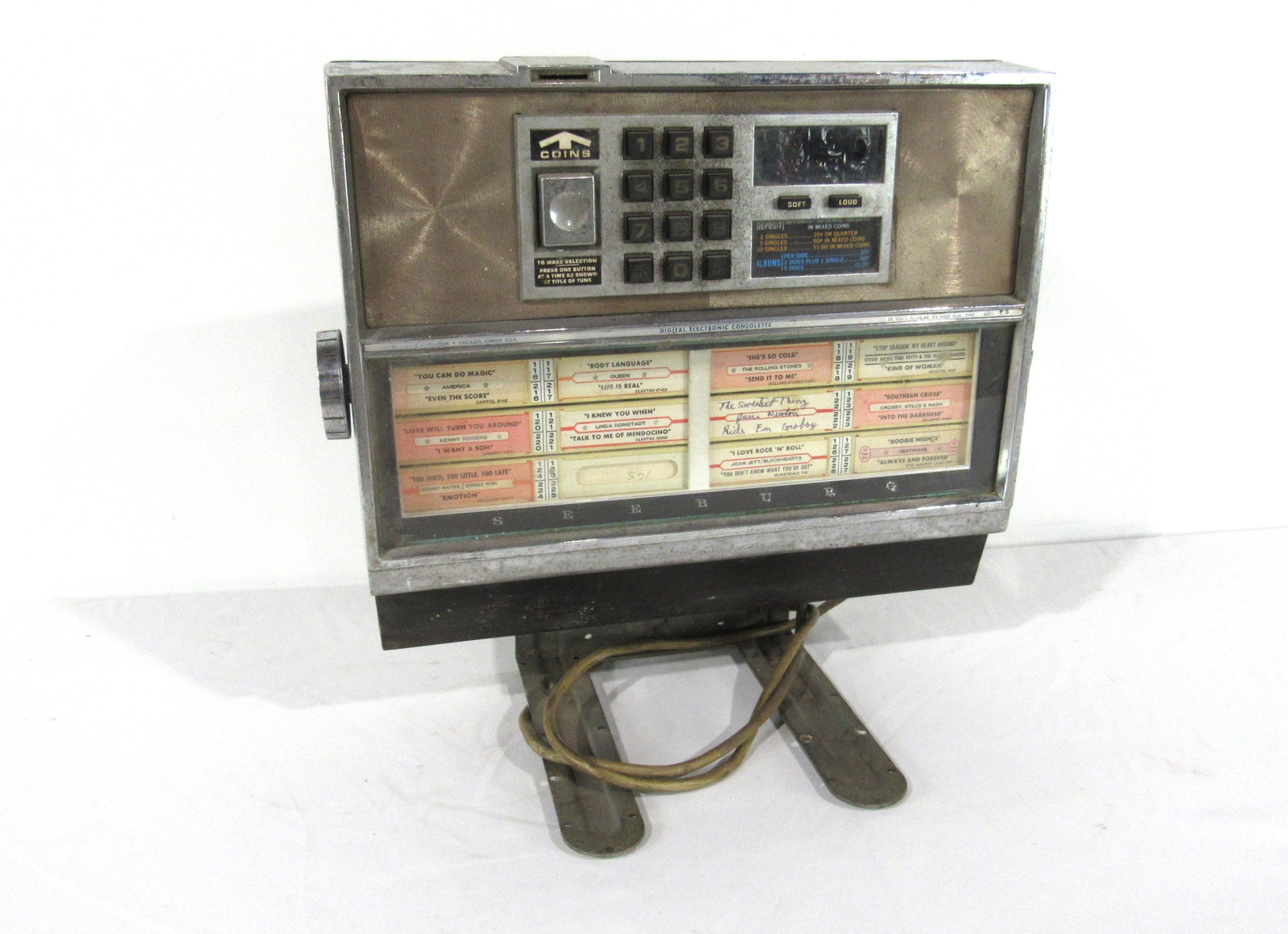 Seeburg Coin Operated Consollete Wallbox on Bracket: Seeburg Coin Operated Consollete Wallbox on Bracket. This item requires third party shipping or pickup arrangements to be made. Dimensions: 40.5 x 17 x 9