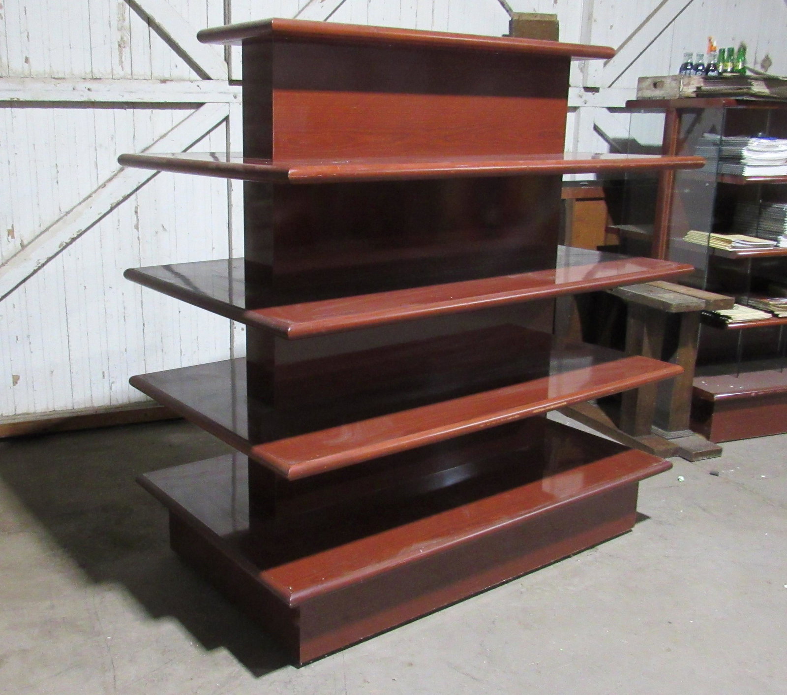 Tiered Store Display Shelf, Lot 1: Tiered Store Display Shelf, Lot 1. This item requires third party shipping or pickup arrangements to be made. Dimensions: 64 x 60 x 36