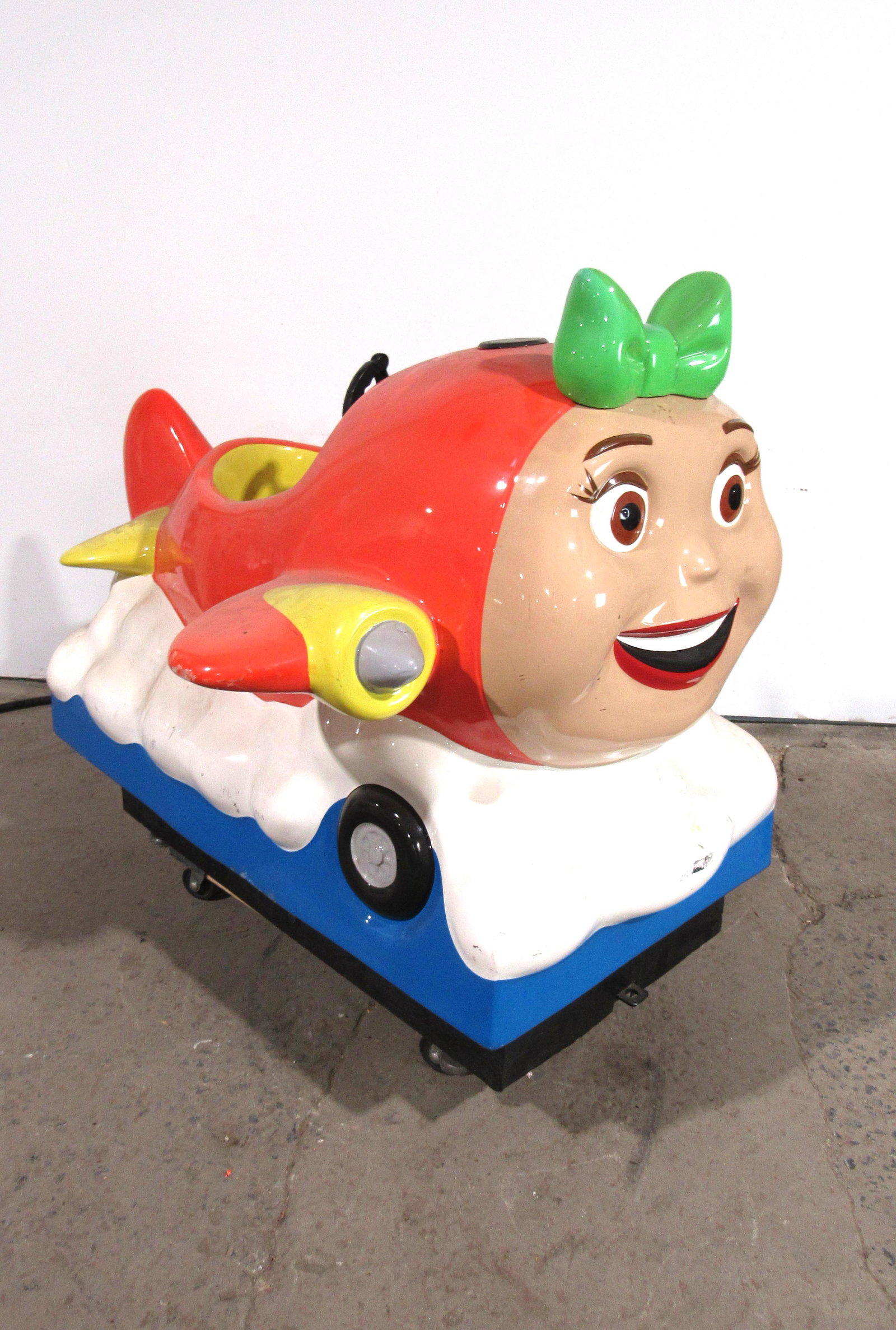 Orange Plane Kiddie Ride: Orange Plane Kiddie Ride. Has sound, no coin. This item requires third party shipping or pickup arrangements to be made. Dimensions: 42 x 50 x 58