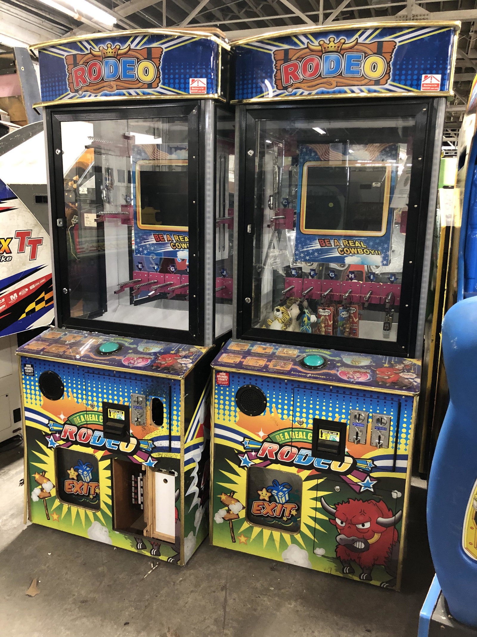Two Rodeo Prize Redemption Arcade Games: Two Rodeo Prize Redemption Arcade Games. Untested, sold as is. Has bill acceptor. This item requires third party shipping or pickup arrangements to be made. Dimensions: 79 x 30 x 35