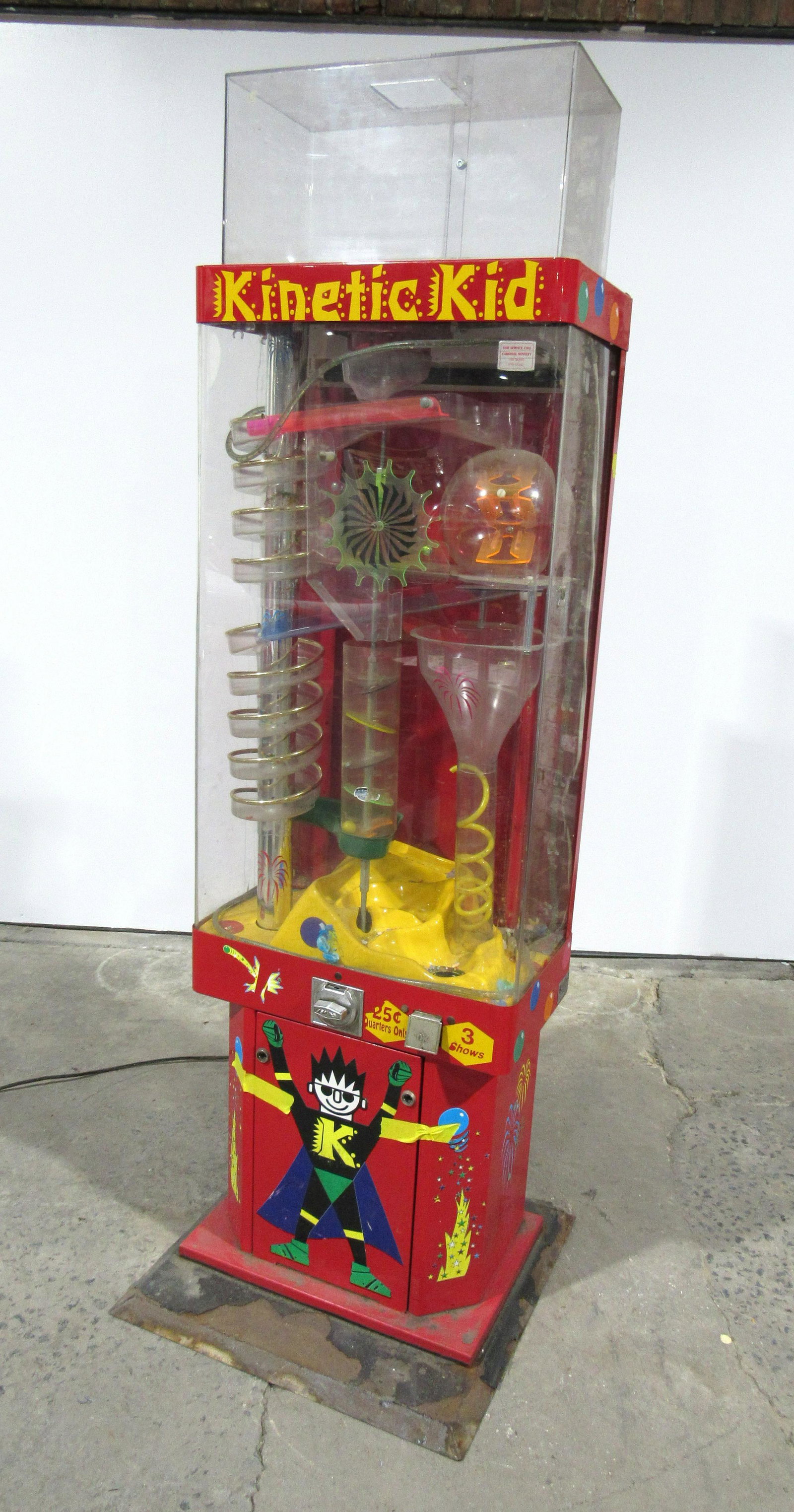 Red Coin Operated Kinetic Kid Gumball Vending Machine: Red Coin Operated Kinetic Kid Gumball Vending Machine. No locks included, missing back mirror. This item requires third party shipping or pickup arrangements to be made. Dimensions: 76 x 26 x 24