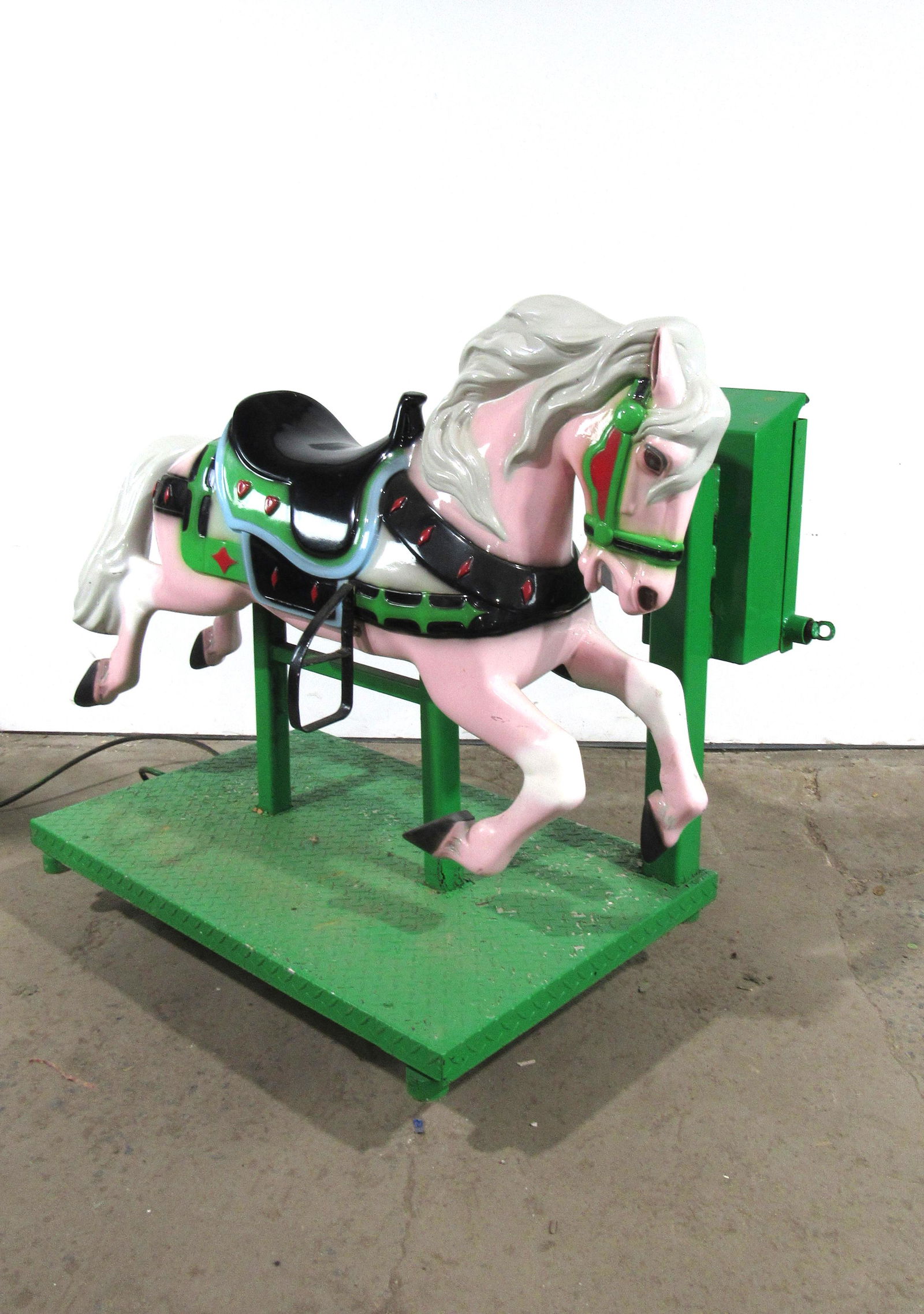 Pink Horse Coin Operated Kiddie Ride: Pink Horse Coin Operated Kiddie Ride, not working. This item requires third party shipping or pickup arrangements to be made. Dimensions: 44 x 36 x 60