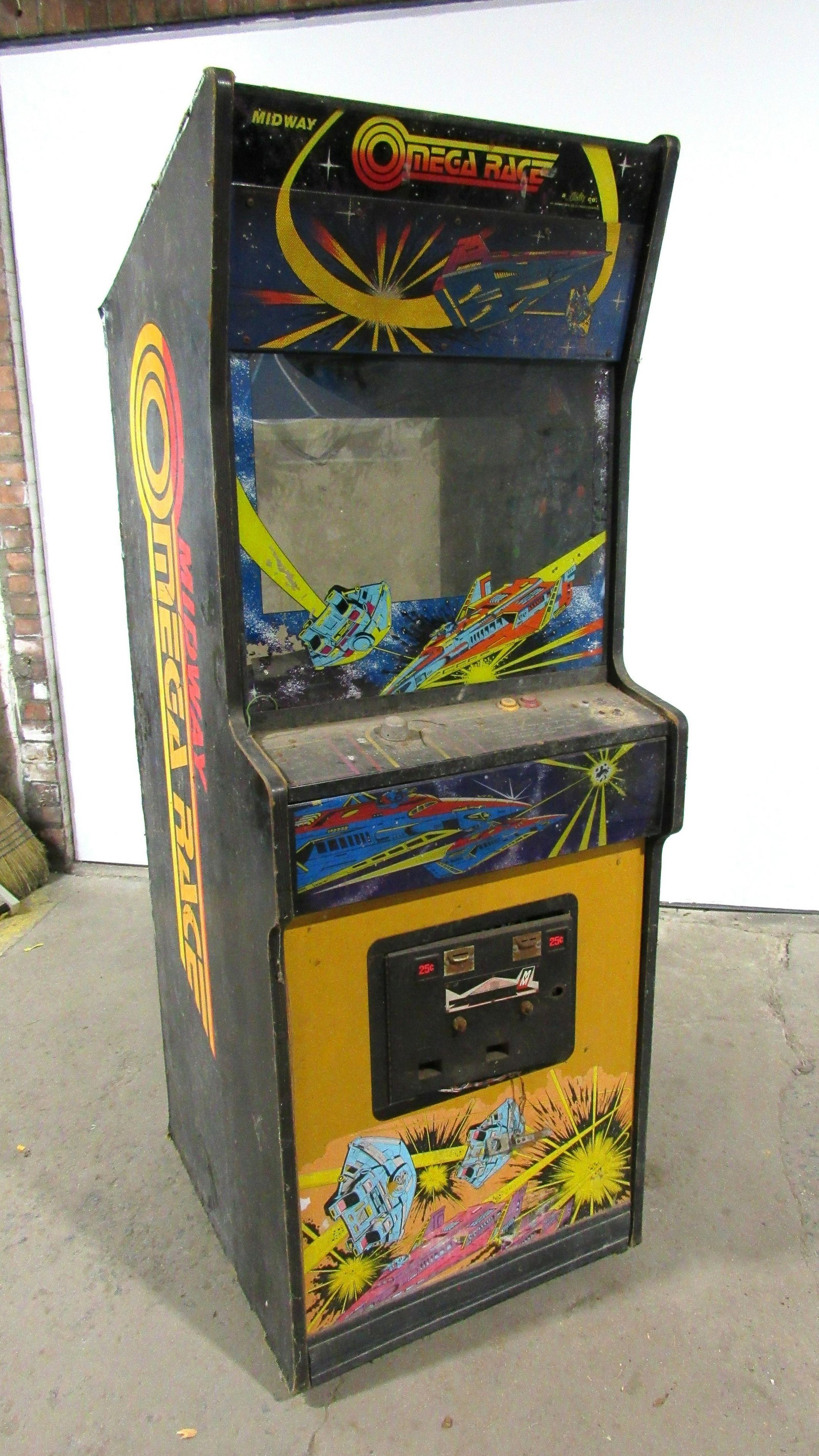 Bally Midway Omega Race Arcade Game: Bally Midway Omega Race Arcade Game, non-working. No backdoor or cardboard shroud. This item requires third party shipping or pickup arrangements to be made. Dimensions: 72 x 26 x 30
