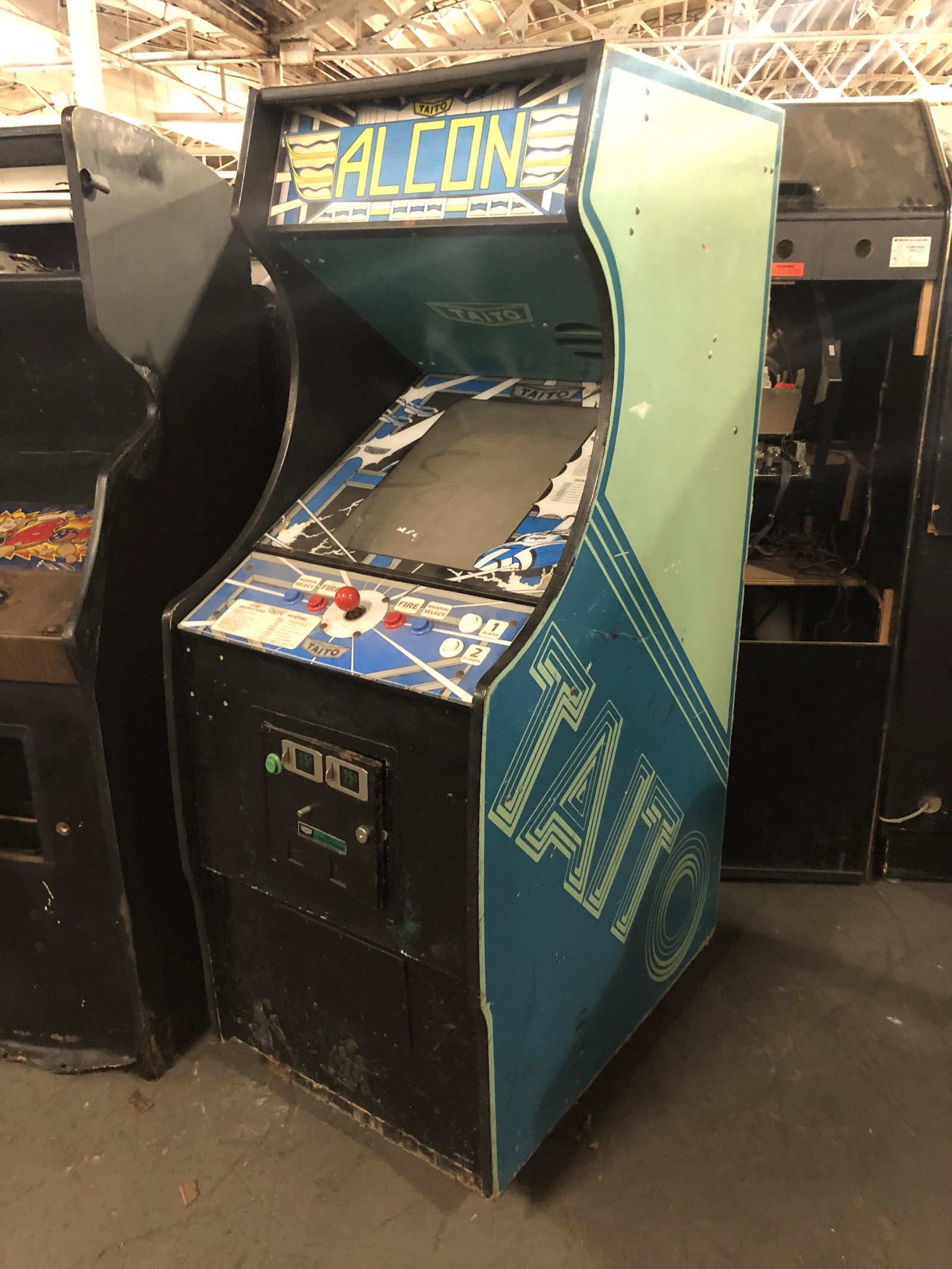 Taito Alcon Arcade Game: Taito Alcon Arcade Game. Plays blind, no picture on screen. This item requires third party shipping or pickup arrangements to be made. Dimensions: 68 x 25 x 36