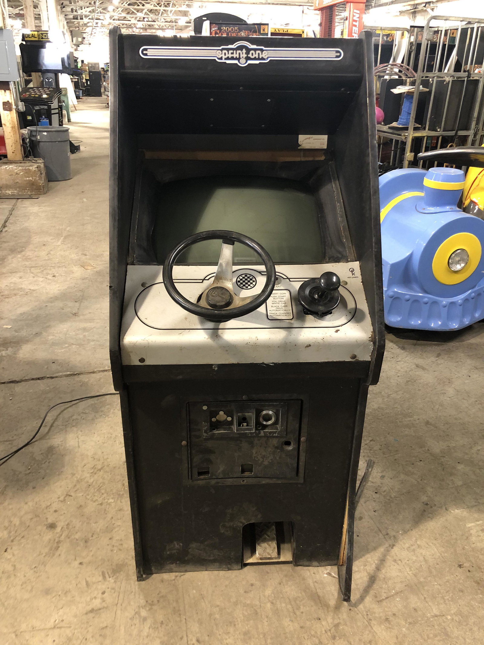 Kee Games Sprint One Arcade Game: Kee Games Sprint One Arcade Game. Complete, not working. This item requires third party shipping or pickup arrangements to be made. Dimensions: 60 x 25 x 28