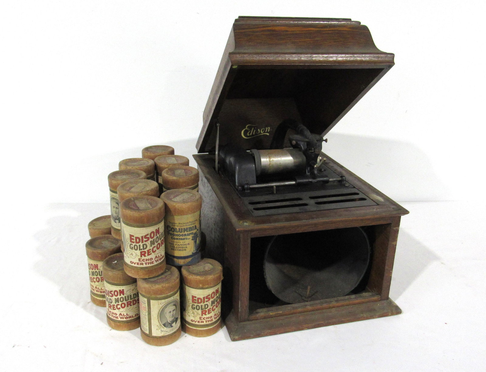 Edison Phonograph Record Player with Records: Edison Phonograph Record Player with Records. Total of 21 records, varying conditions. This item requires third party shipping or pickup arrangements to be made. Dimensions: 13 x 16 x 16