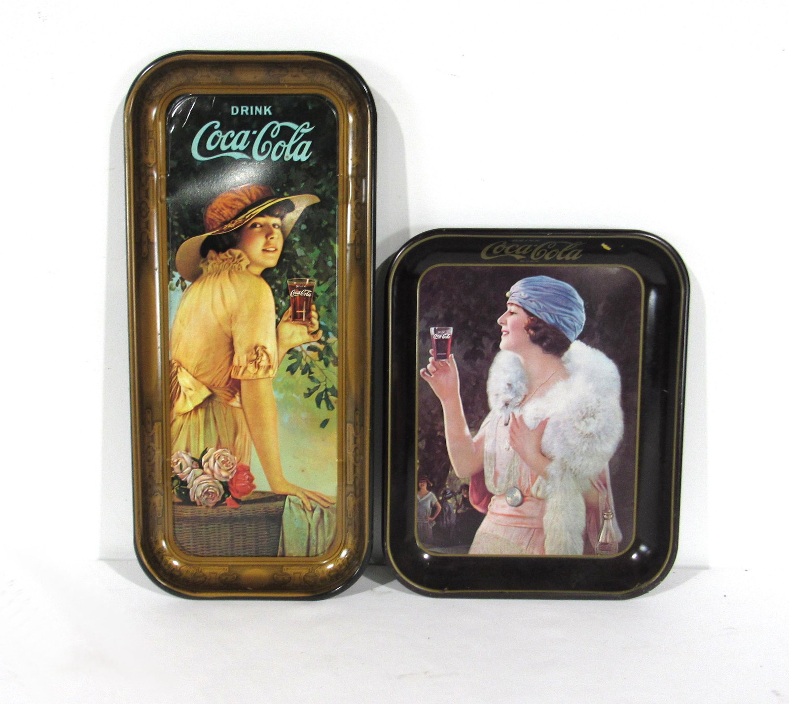 Two Coca-Cola / Coke Advertising Trays: Two Coca-Cola / Coke Advertising Trays. In-house shipping available. Dimensions: 19 x 9 x 2