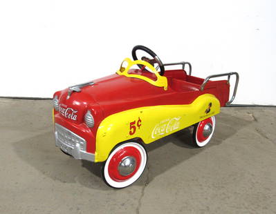 Coca Cola Gearbox Pedal Car: Coca Cola Gearbox Pedal Car. This item requires third party shipping or pickup arrangements to be made. Dimensions: 20 x 16 x 42