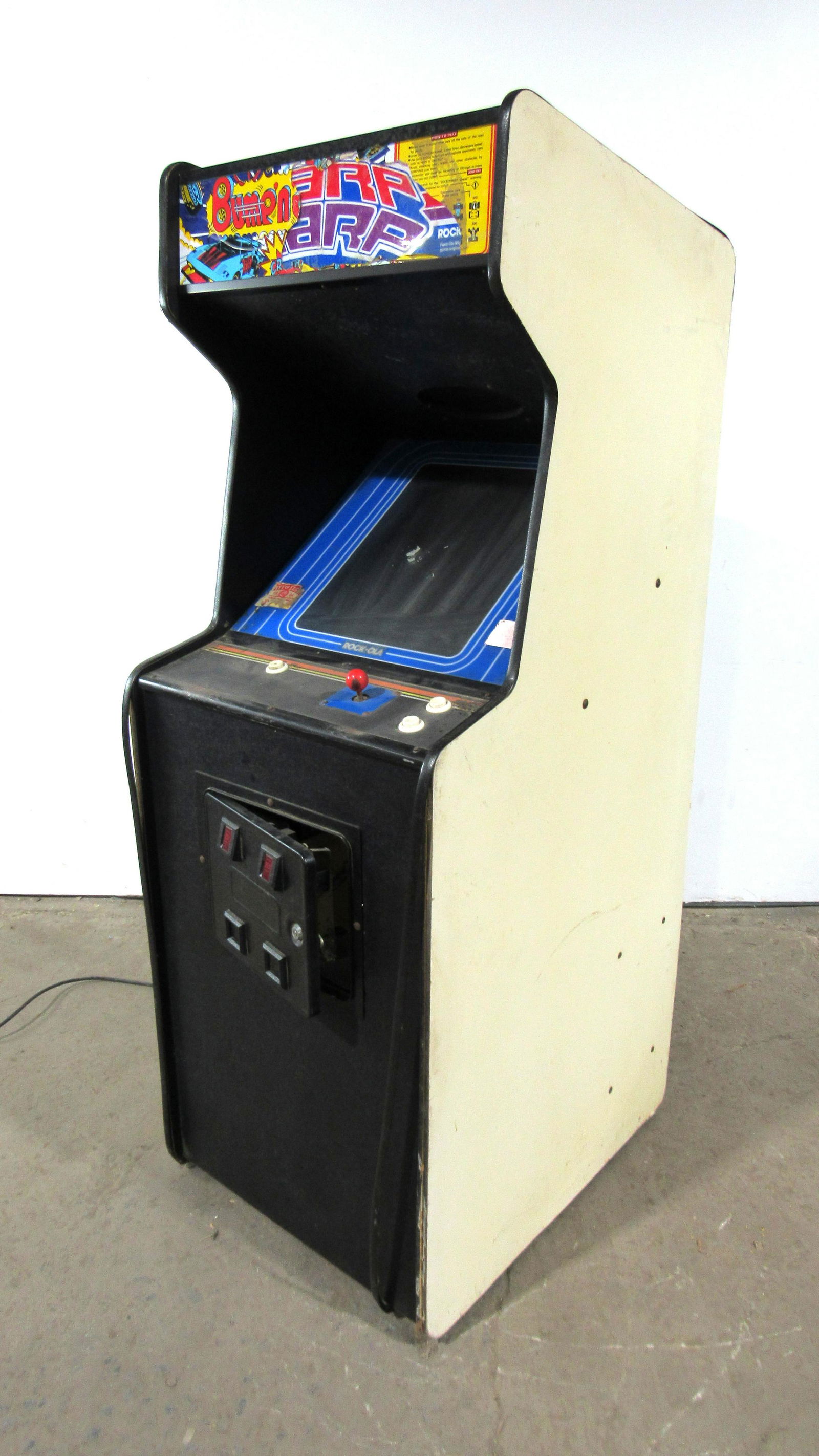 Bally Bump N' Jump Arcade in Warp Warp Cabinet: Bally Bump N' Jump Arcade in Warp Warp Cabinet. Plays blind, no picture on screen. No back door. This item requires third party shipping or pickup arrangements to be made. Dimensions: 67 x 24 x 30