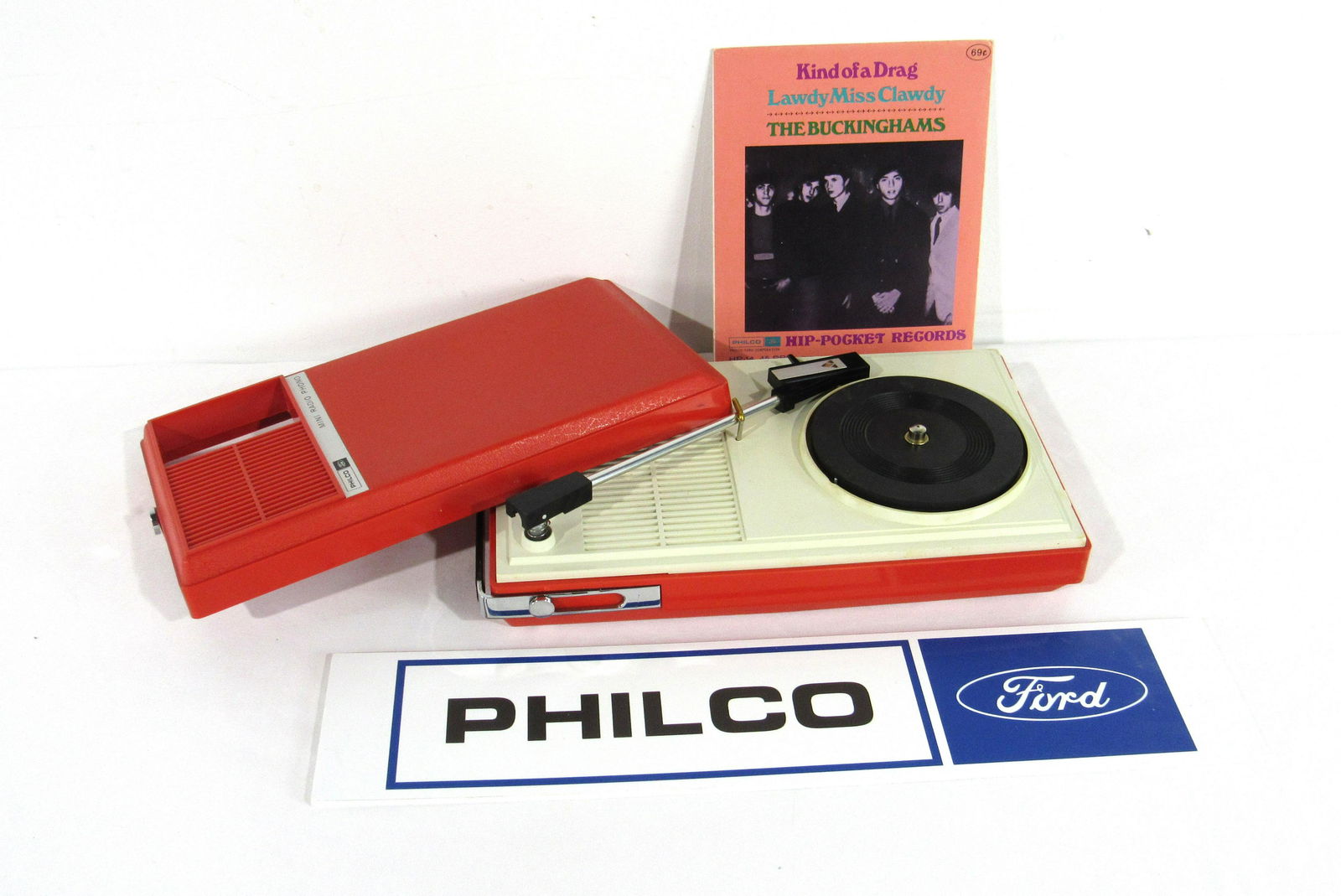Red Philco/Ford Model R-1376 "Hip Pocket" Record Player: 1967 Red Philco/Ford Model R-1376 "Hip Pocket" Record Player Radio. Plays anything from 4" hip pocket records (one included) up to LPs. Recently serviced with new batteries and replacement sign. In-ho