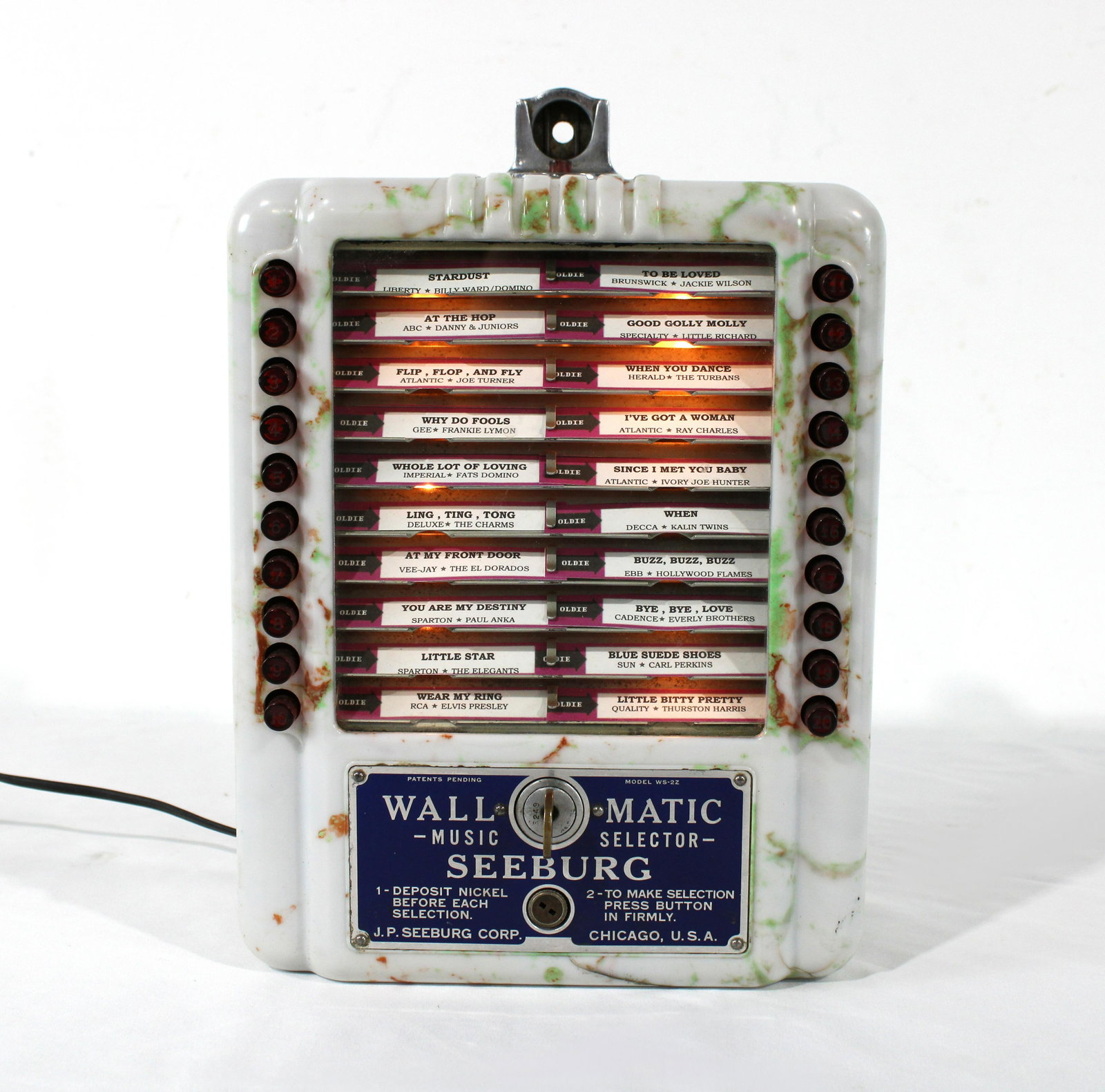 Seeburg Beetle Plastic Wall-O-Matic Coin Op Wallbox: Seeburg Beetle Plastic Wall-O-Matic Coin Operated Wallbox. Repairs made to crack on bottom. This item requires third party shipping or pickup arrangements to be made. Dimensions: 13 x 9 x 5