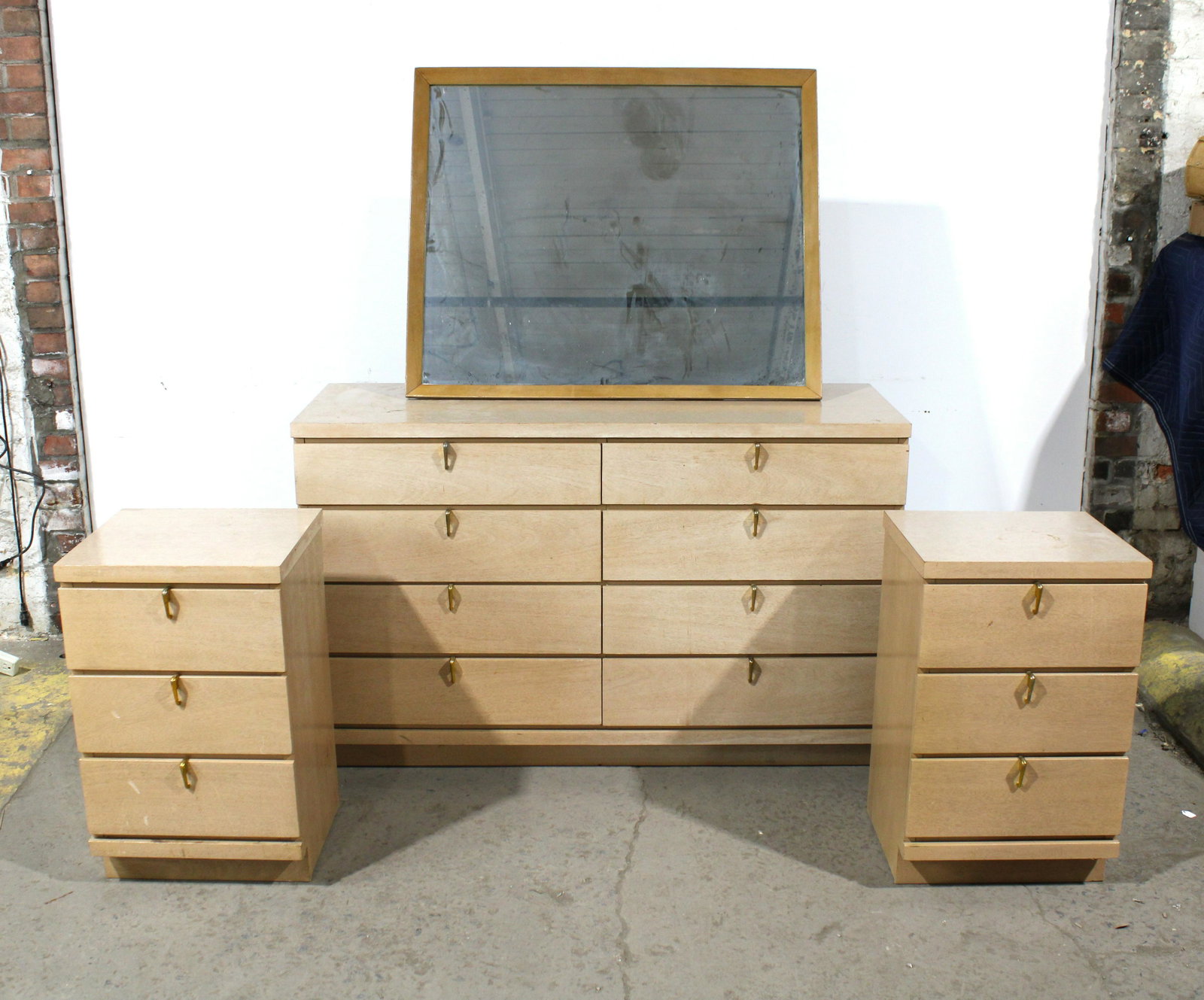 Mid Century Blonde Dresser and Nightstands: Mid Century Blonde Dresser and Nightstands. Unmarked. This item requires third party shipping or pickup arrangements to be made. Dimensions: 31 x 50 x 18.5