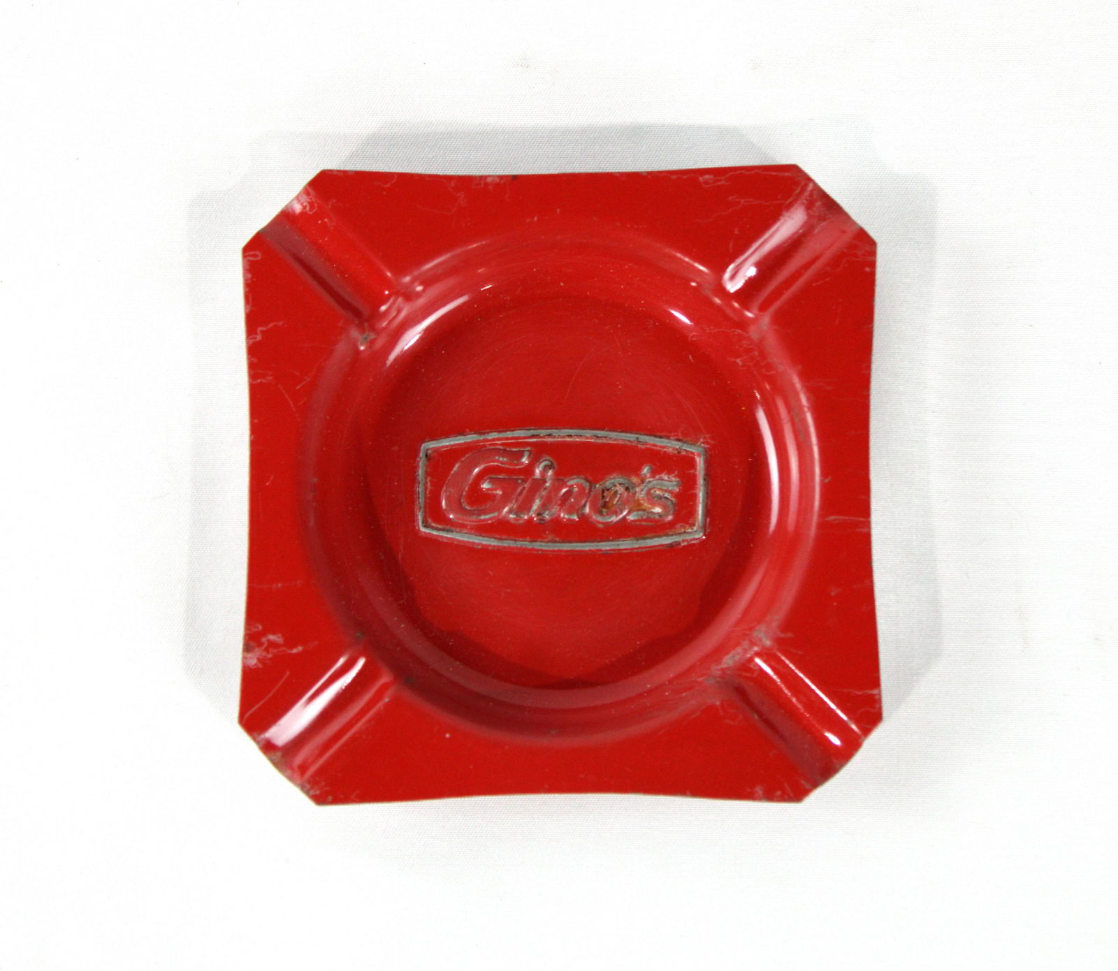 Metal Ashtray from Gino's Restaurant, Baltimore, MD: Original Metal Ashtray from Gino's (Baltimore Colts) Restaurant. This approximately 4" square metal ashtray is embossed "Gino's" from the original 1959 restaurant in Baltimore started by Baltimore Col