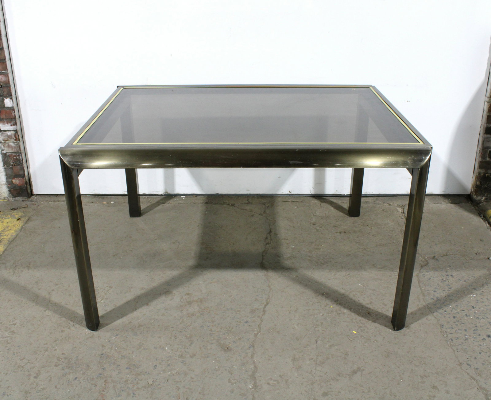 Milo Baughman Expanding Hidden Leaf Dining Table: Milo Baughman for Design Institue of America Glass Expanding Hidden Leaf Dining Table. This item requires third party shipping or pickup arrangements to be made. Dimensions: 31 x 52 x 42