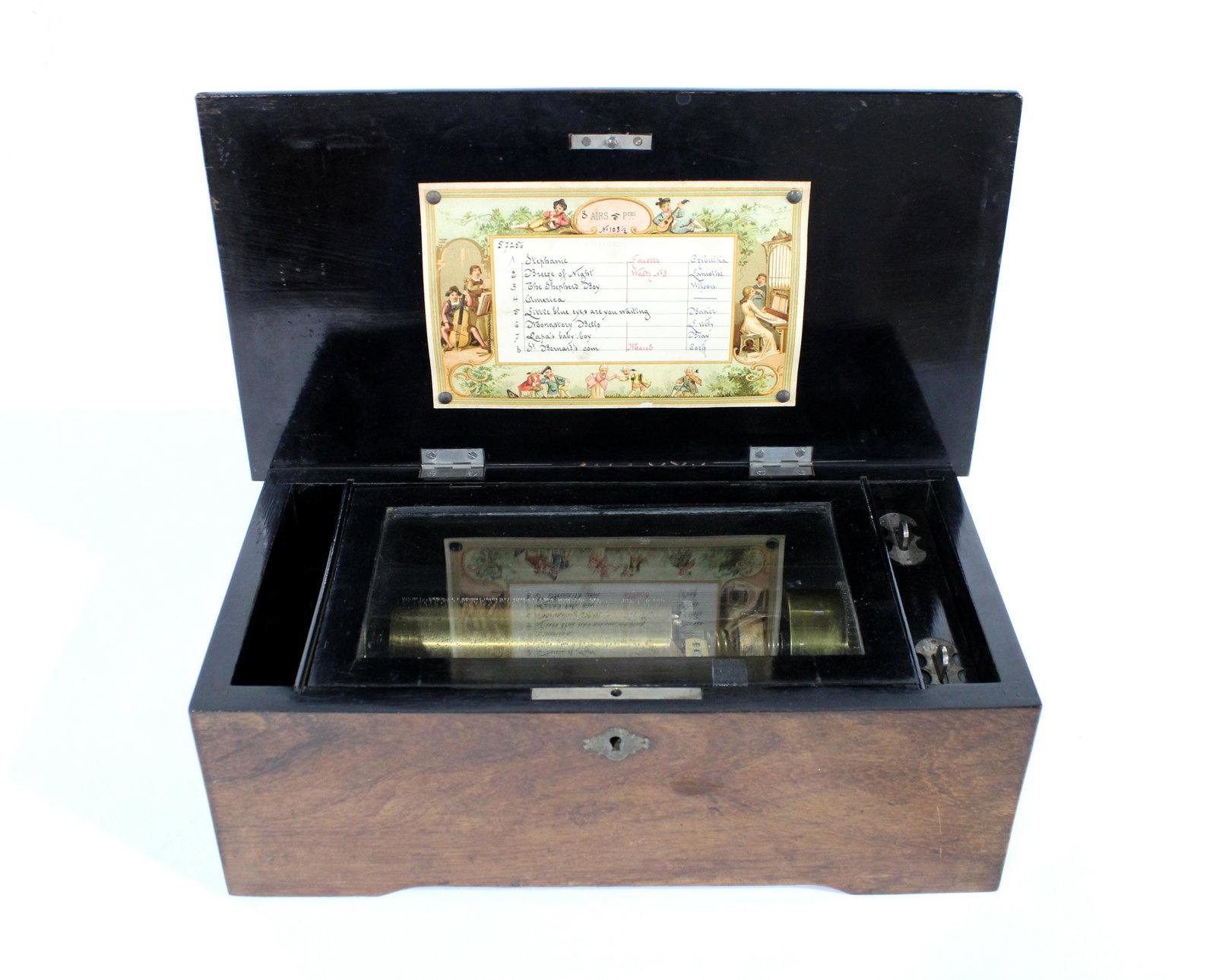 Antique Swiss Cylinder 8-Tune Music Box: Antique Swiss Cylinder 8-Tune Music Box, circa 1890. Working. In-house shipping available. Dimensions: 5 x 14 x 8